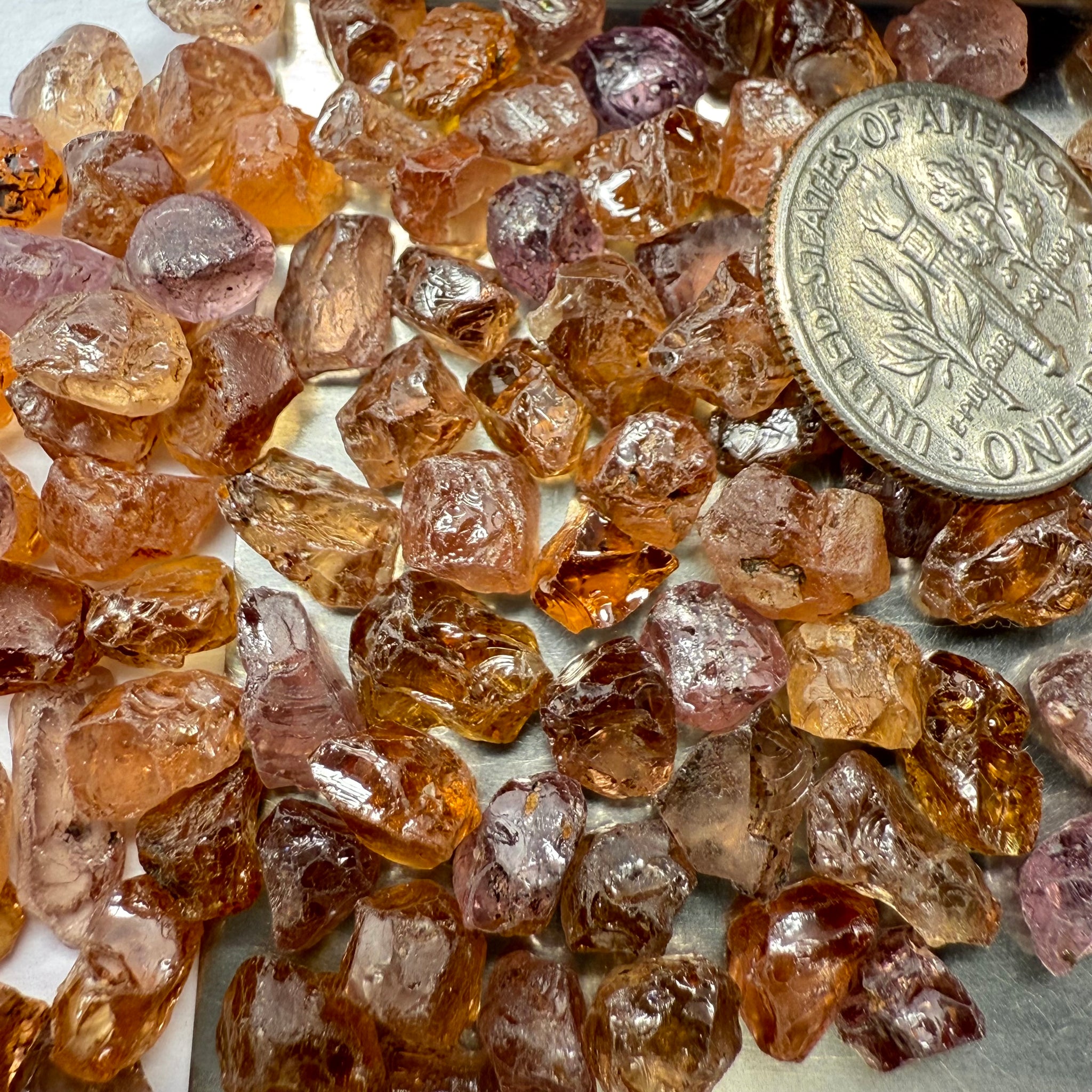 Garnet MIX, look closely it’s a whole mix of Mandarins, Colour Changers, Lindi, Mahenge Garnets and more all mixed up, see closeup, Tanzania, Untreated Unheated. SINGLES price is per piece sold on a blind pour basis, some clean some included, av. 1.4ct