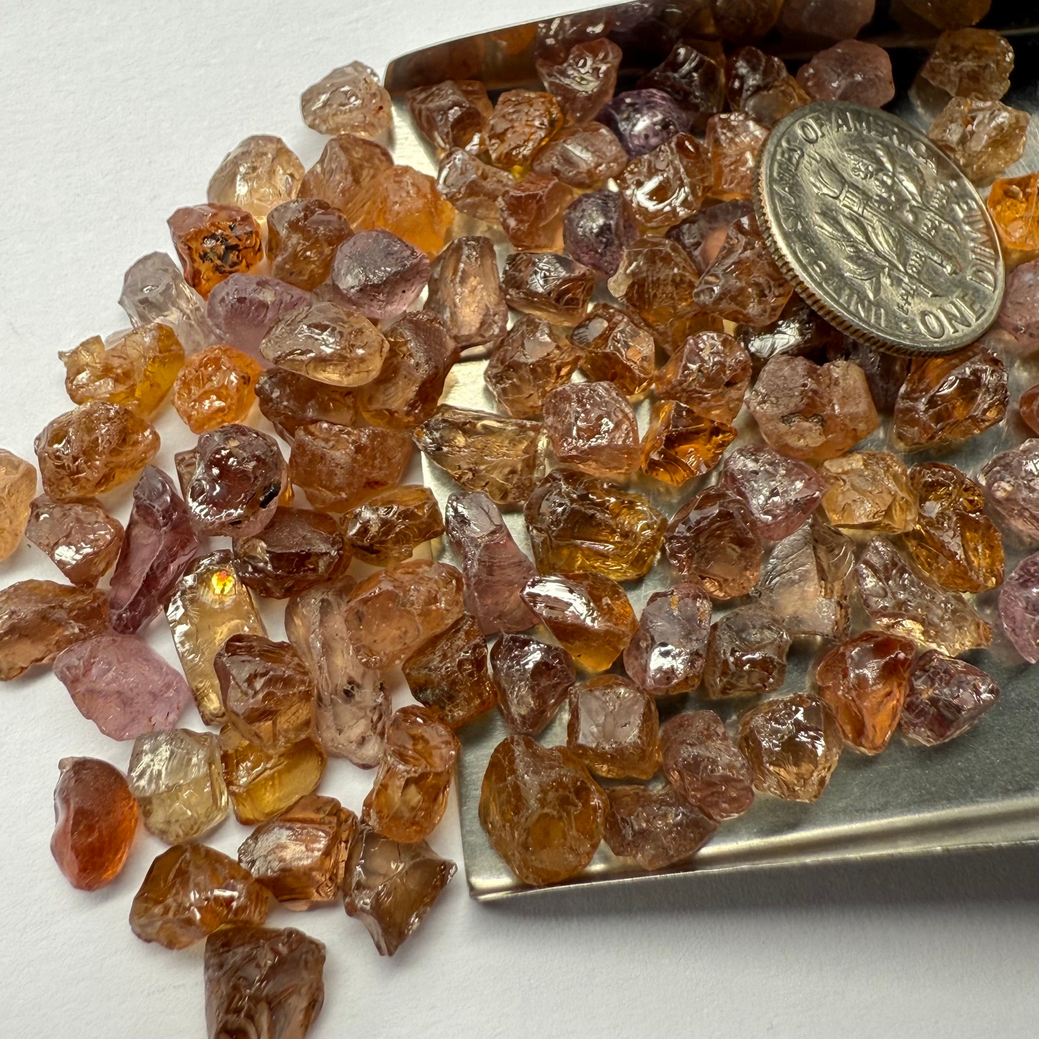 Garnet MIX, look closely it’s a whole mix of Mandarins, Colour Changers, Lindi, Mahenge Garnets and more all mixed up, see closeup, Tanzania, Untreated Unheated. SINGLES price is per piece sold on a blind pour basis, some clean some included, av. 1.4ct