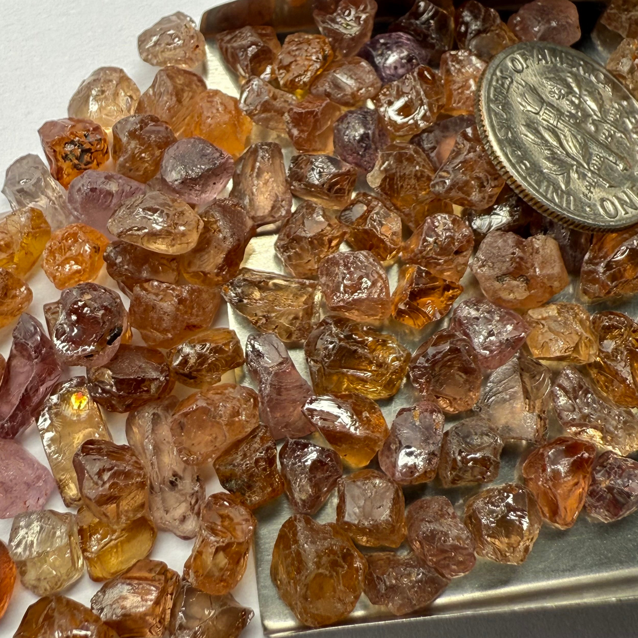 Garnet MIX, look closely it’s a whole mix of Mandarins, Colour Changers, Lindi, Mahenge Garnets and more all mixed up, see closeup, Tanzania, Untreated Unheated. SINGLES price is per piece sold on a blind pour basis, some clean some included, av. 1.4ct