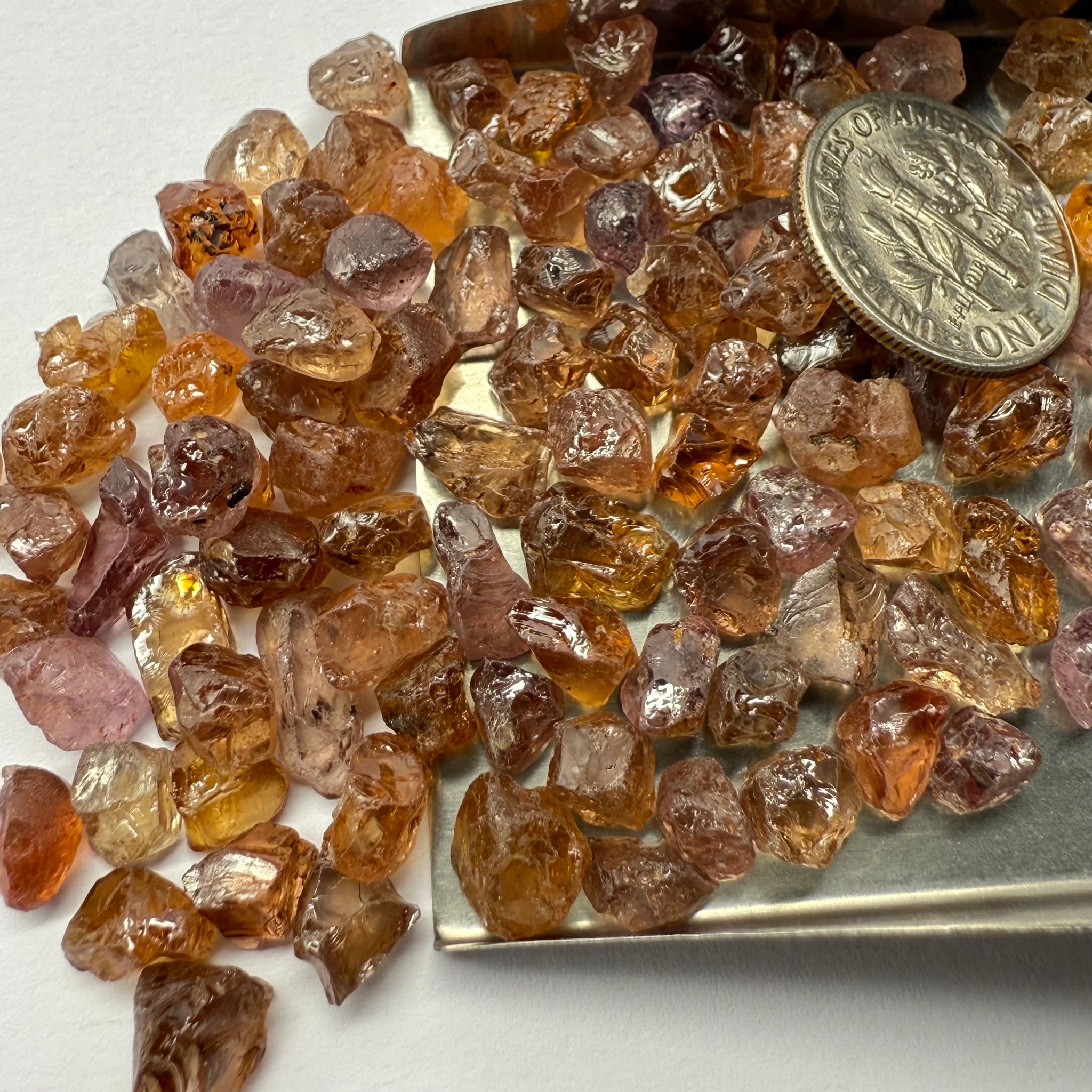 Garnet MIX, look closely it’s a whole mix of Mandarins, Colour Changers, Lindi, Mahenge Garnets and more all mixed up, see closeup, Tanzania, Untreated Unheated. SINGLES price is per piece sold on a blind pour basis, some clean some included, av. 1.4ct
