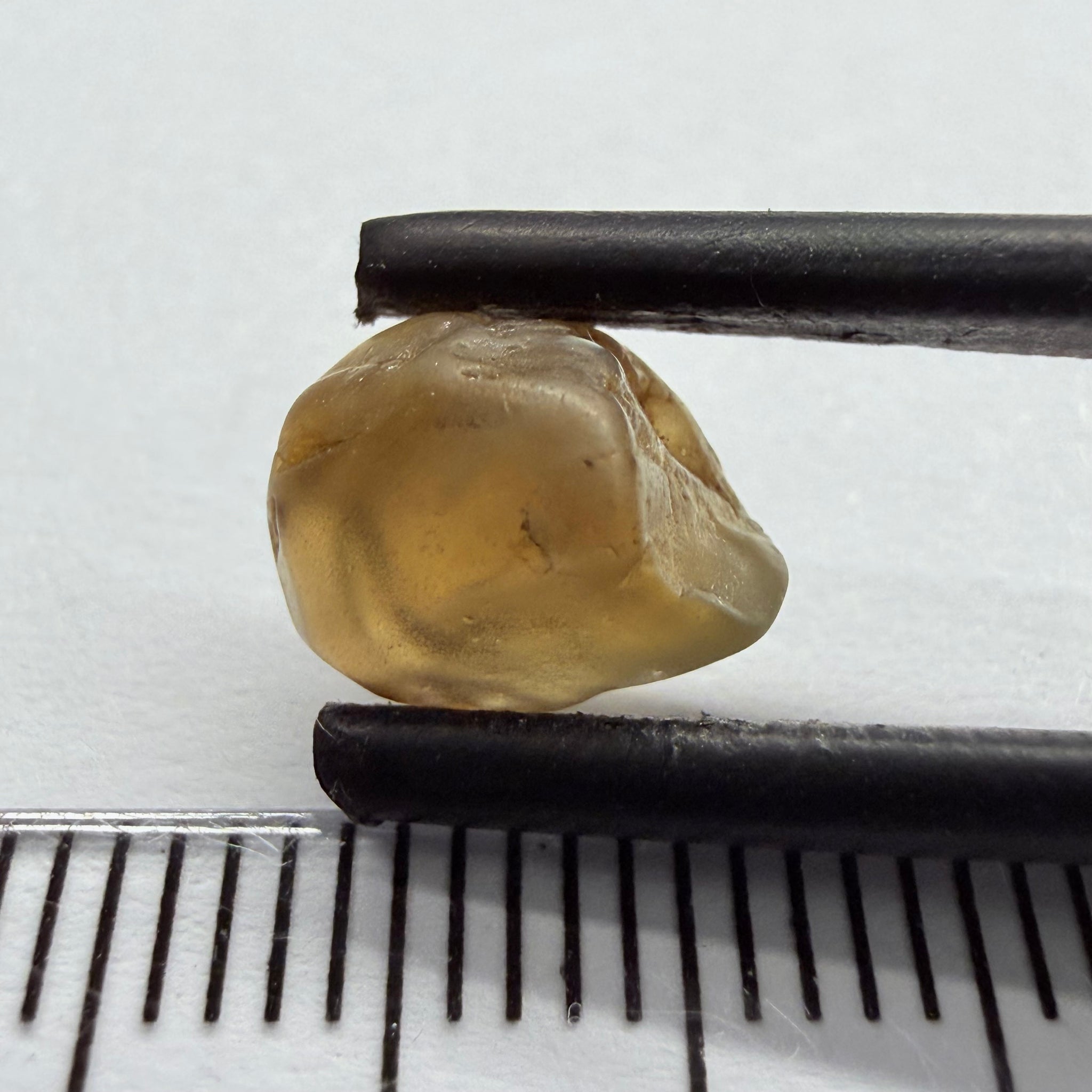 Colour Changing Chrysoberyl, 3.13ct, Tunduru, Tanzania, Untreated Unheated, the colour change is very slight, there is some surface gunk that needs to be removed on one side, rest has very fine silk