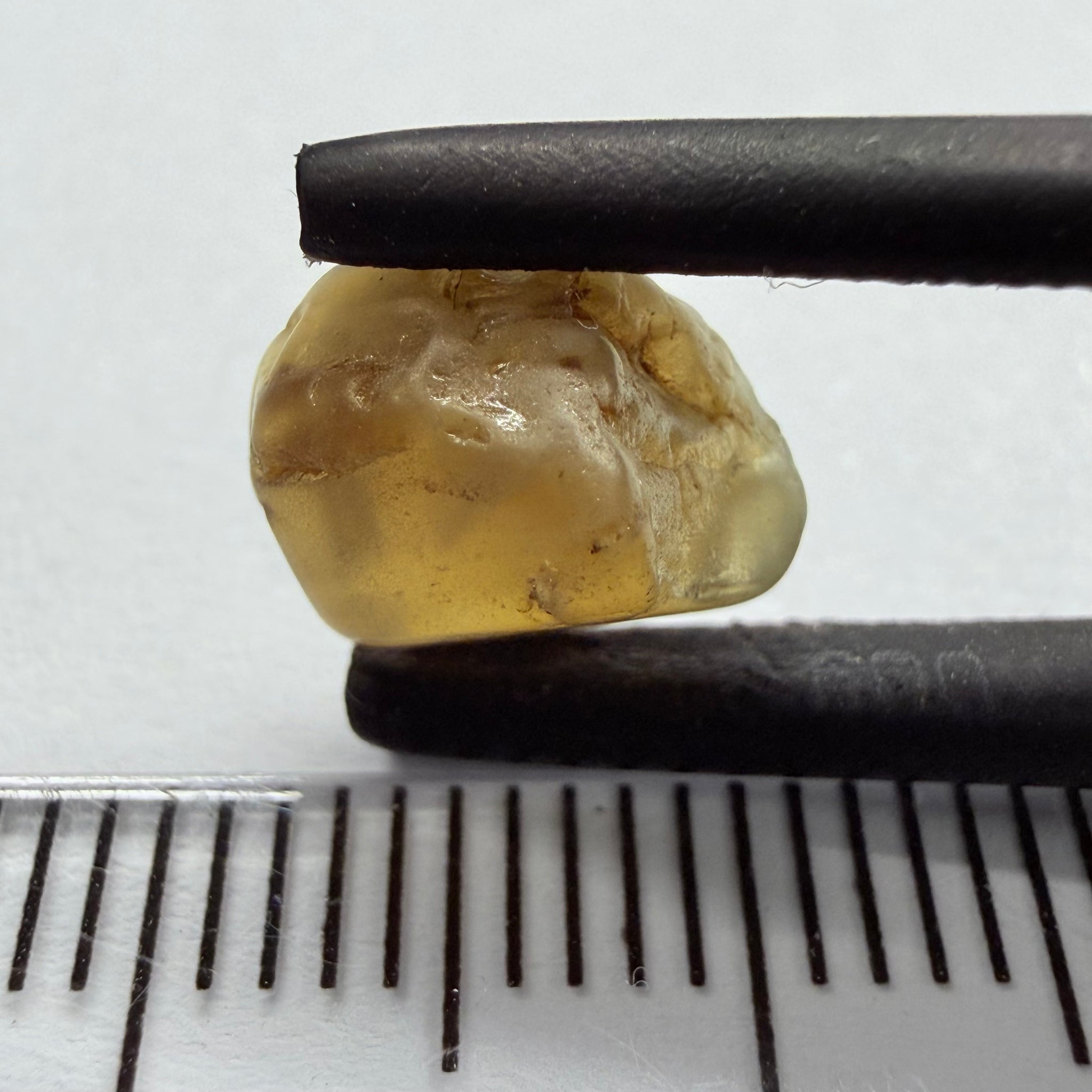 Colour Changing Chrysoberyl, 3.13ct, Tunduru, Tanzania, Untreated Unheated, the colour change is very slight, there is some surface gunk that needs to be removed on one side, rest has very fine silk
