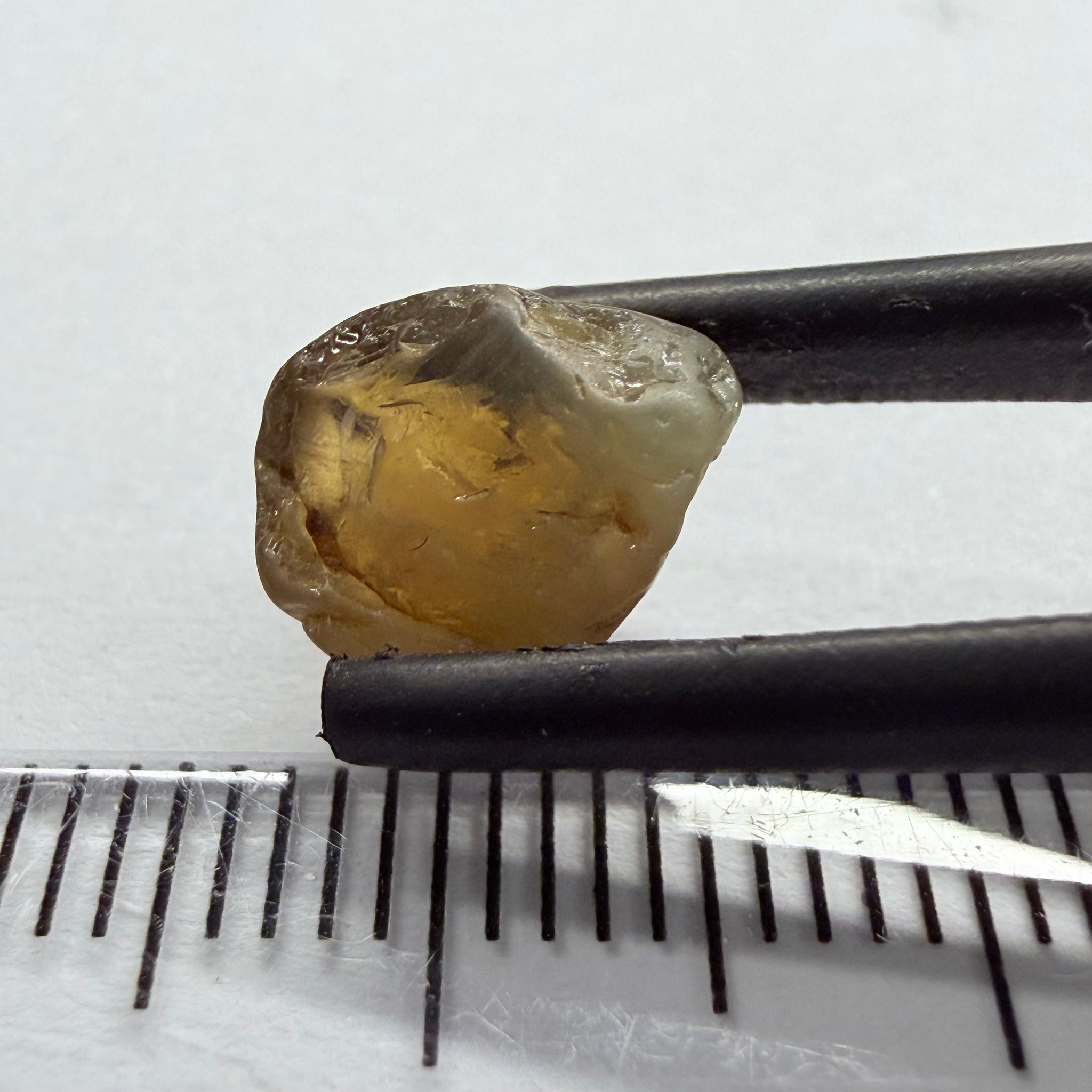 Colour Changing Chrysoberyl, 3.13ct, Tunduru, Tanzania, Untreated Unheated, the colour change is very slight, there is some surface gunk that needs to be removed on one side, rest has very fine silk