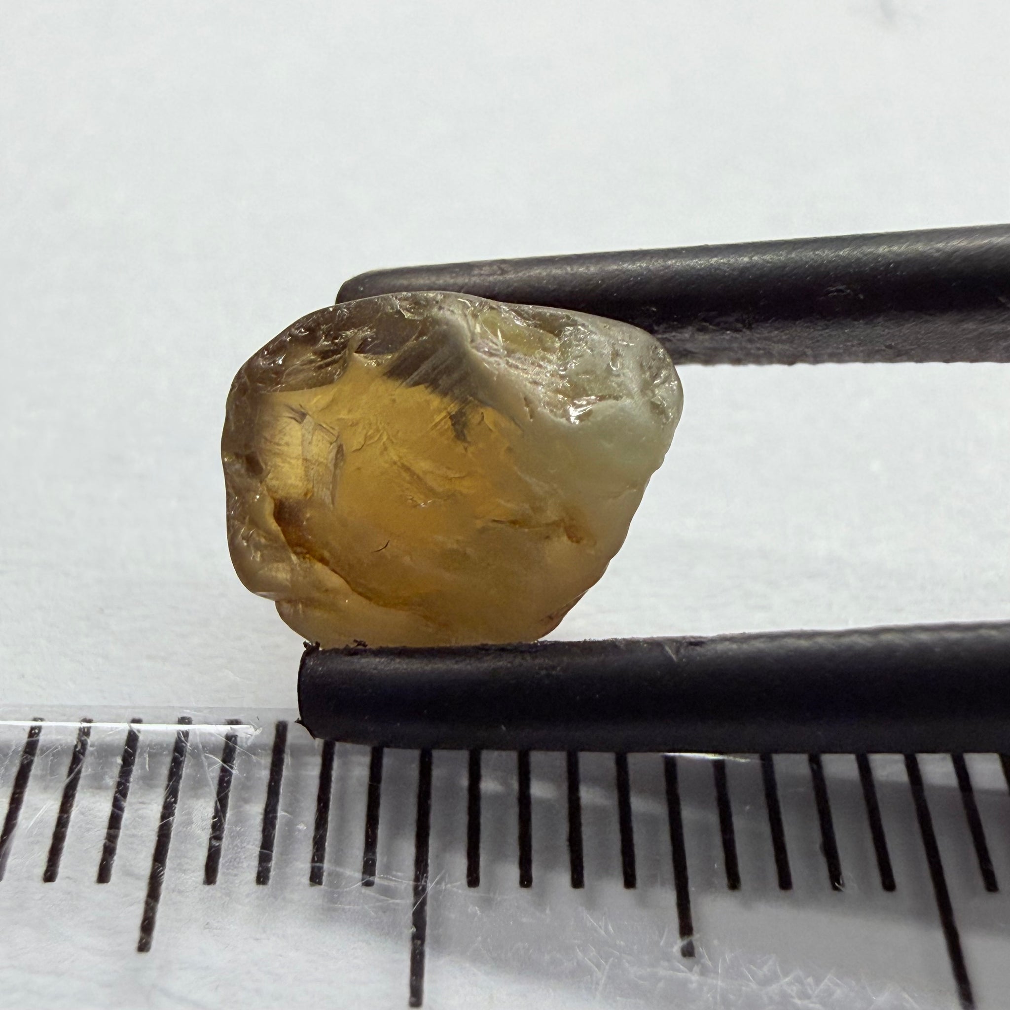 Colour Changing Chrysoberyl, 3.13ct, Tunduru, Tanzania, Untreated Unheated, the colour change is very slight, there is some surface gunk that needs to be removed on one side, rest has very fine silk