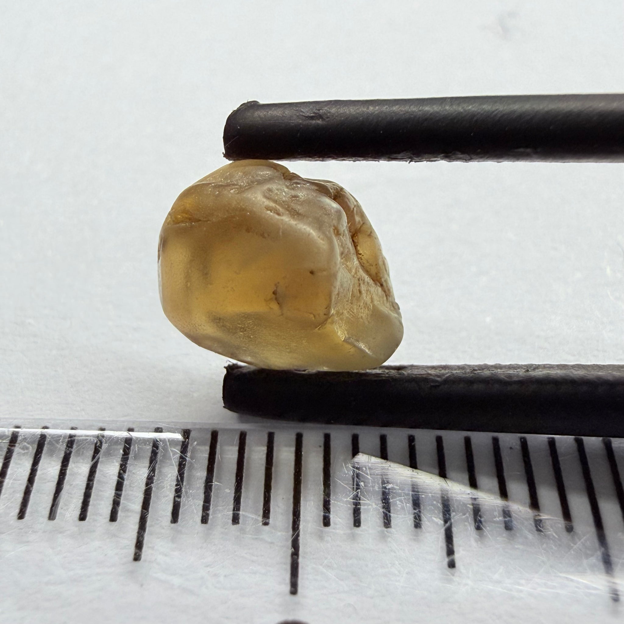 Colour Changing Chrysoberyl, 3.13ct, Tunduru, Tanzania, Untreated Unheated, the colour change is very slight, there is some surface gunk that needs to be removed on one side, rest has very fine silk
