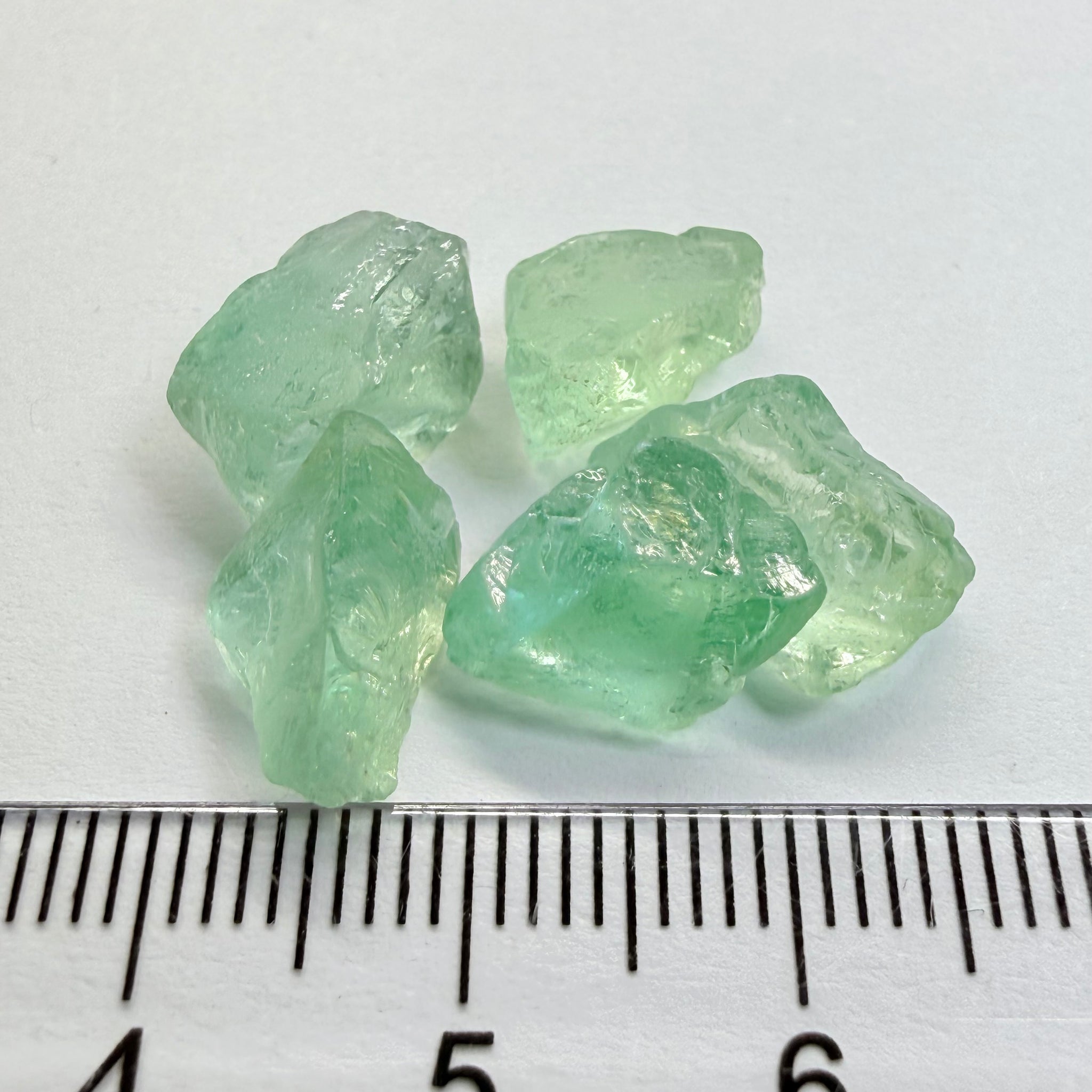 Aquamarine Lot, 22.31ct, Loliondo, Tanzania, Untreated Unheated, vs-vvs, one has a flat shape