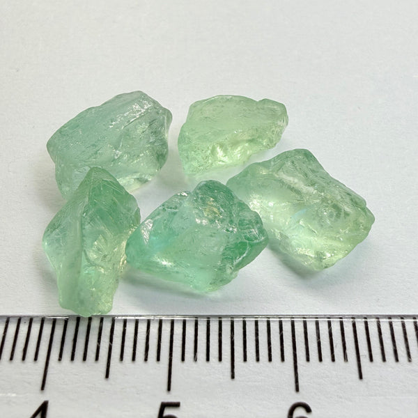 Aquamarine Lot, 22.31ct, Loliondo, Tanzania, Untreated Unheated, vs-vvs, one has a flat shape