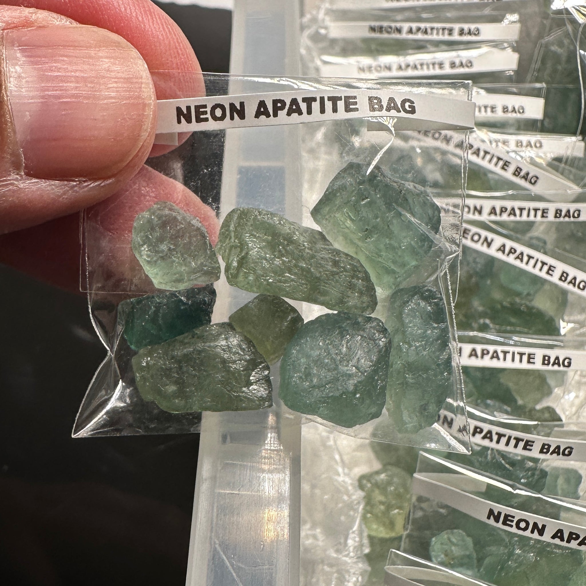 Neon Apatite Bag, Tanzania, specimen / cabbing grade, some faceting grade rough