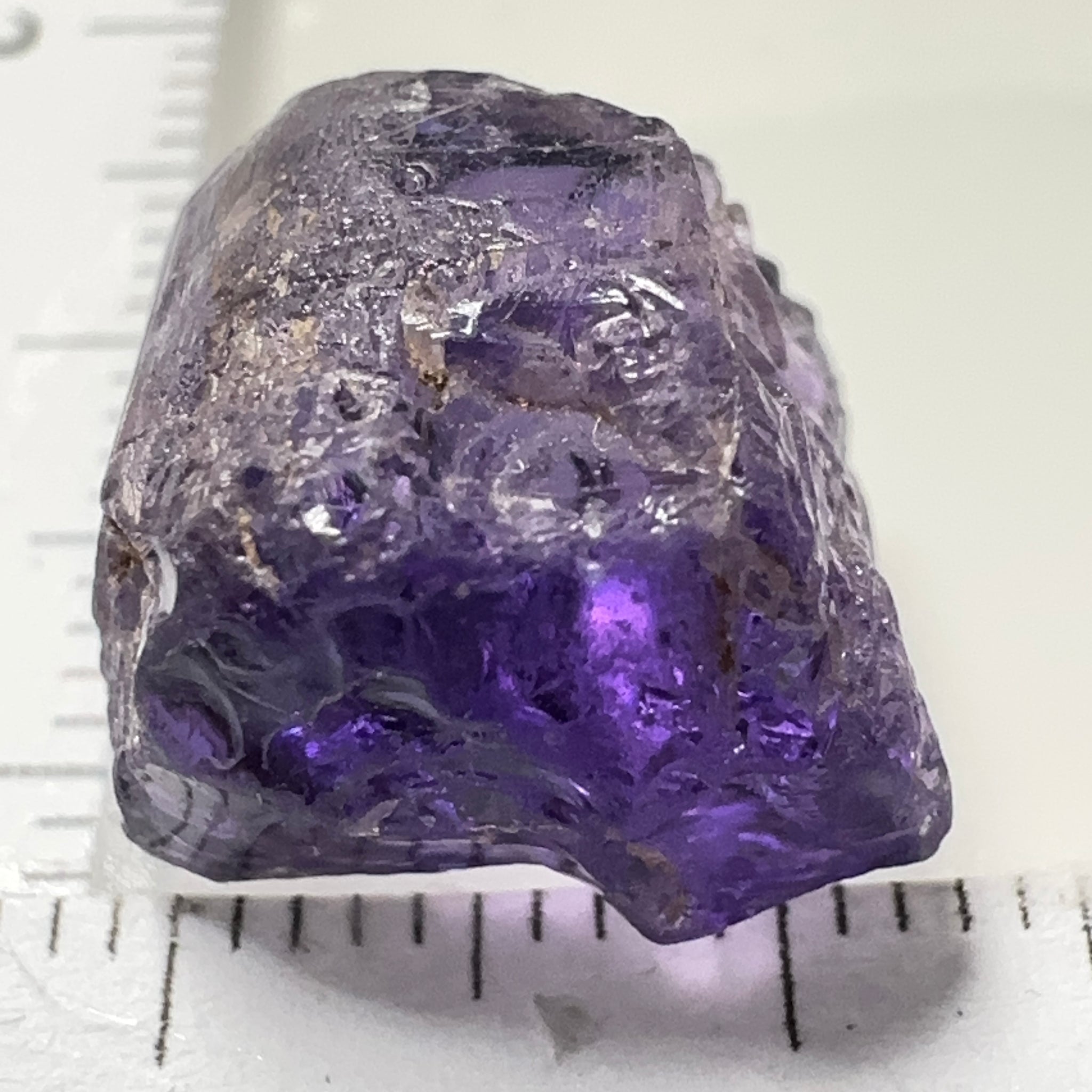 Purple Scapolite Crystal, 12.14ct, Tanzania, Untreated Unheated. Has a dividing crack, will need to be sawed, one side will be vvs-if clean, the other will be the same but will need some inclusions on the outside removed.