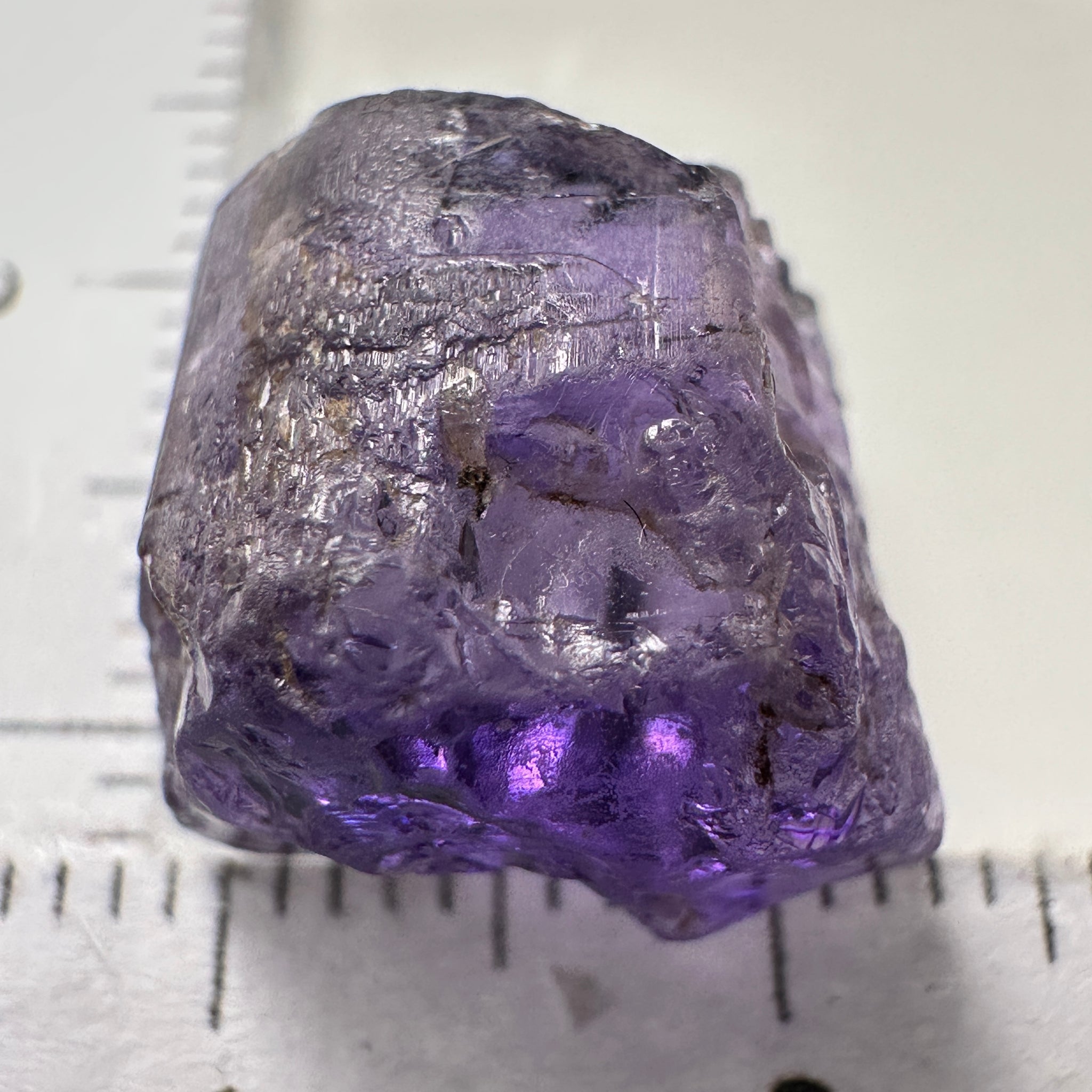 Purple Scapolite Crystal, 12.14ct, Tanzania, Untreated Unheated. Has a dividing crack, will need to be sawed, one side will be vvs-if clean, the other will be the same but will need some inclusions on the outside removed.