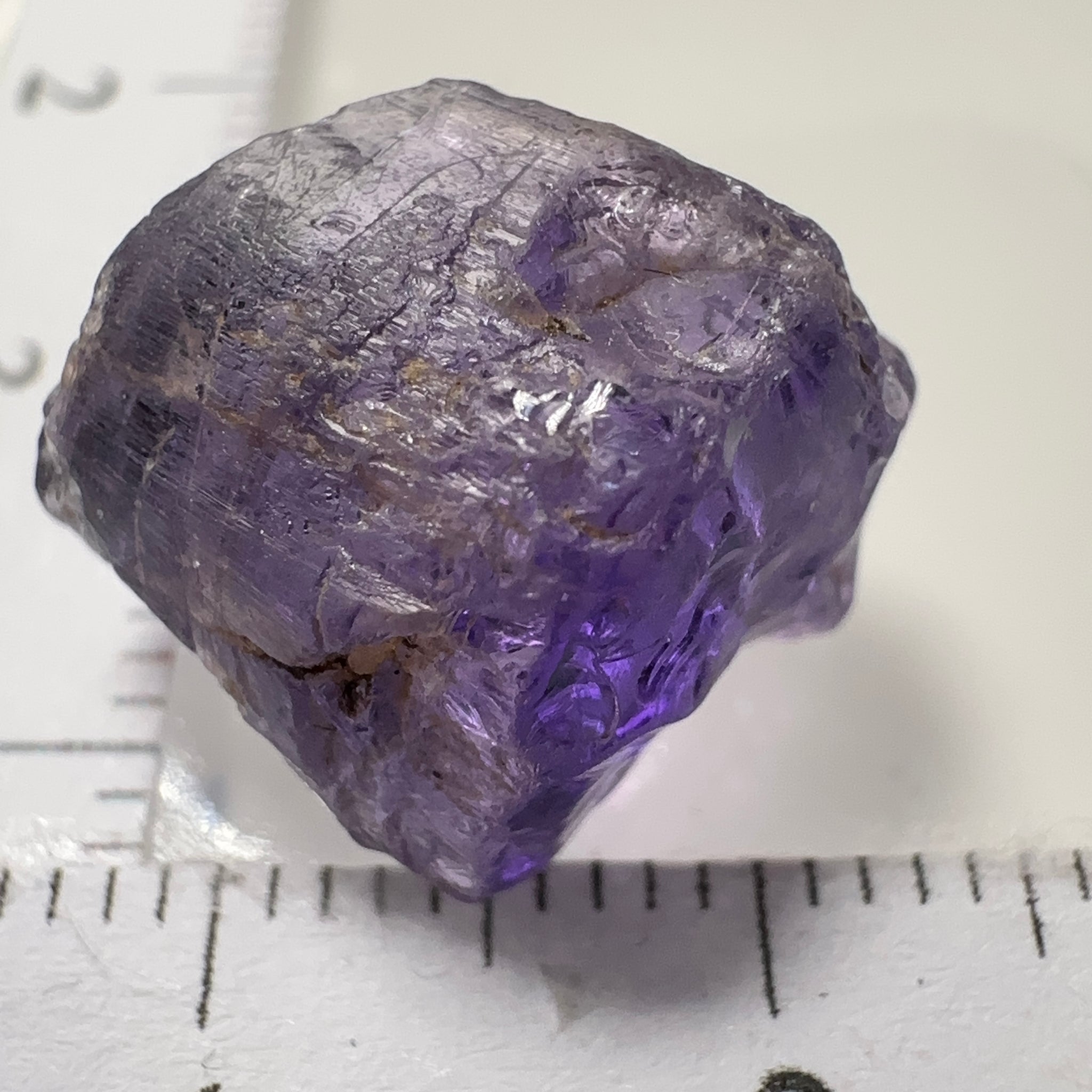 Purple Scapolite Crystal, 12.14ct, Tanzania, Untreated Unheated. Has a dividing crack, will need to be sawed, one side will be vvs-if clean, the other will be the same but will need some inclusions on the outside removed.