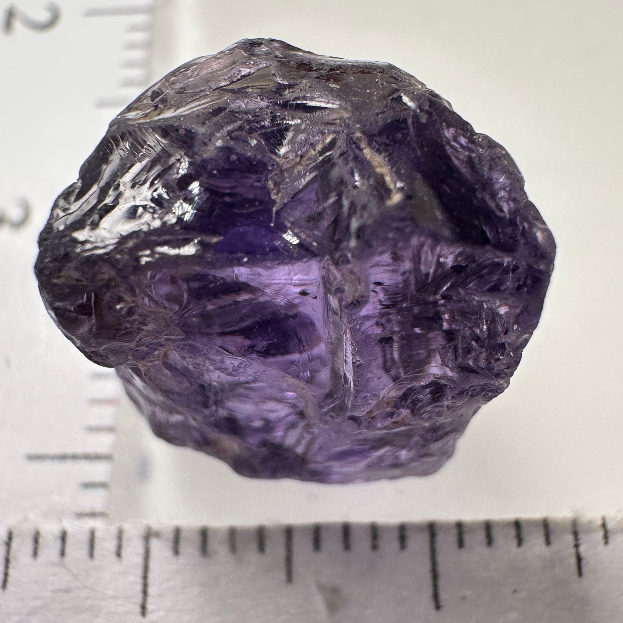 Purple Scapolite Crystal, 12.14ct, Tanzania, Untreated Unheated. Has a dividing crack, will need to be sawed, one side will be vvs-if clean, the other will be the same but will need some inclusions on the outside removed.