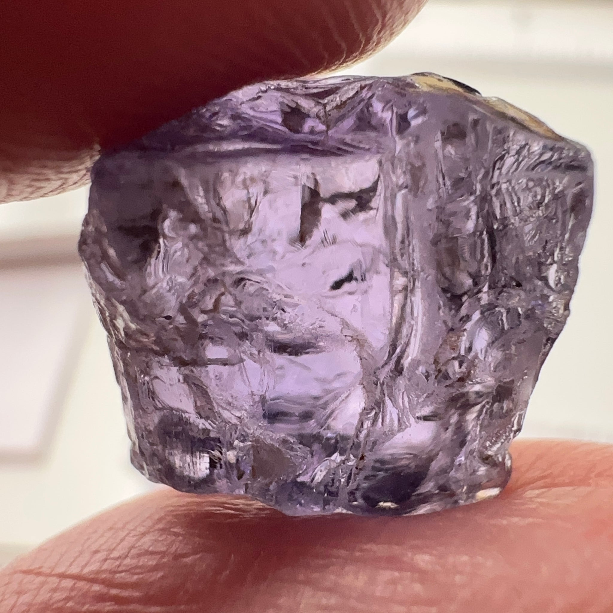 Purple Scapolite Crystal, 12.14ct, Tanzania, Untreated Unheated. Has a dividing crack, will need to be sawed, one side will be vvs-if clean, the other will be the same but will need some inclusions on the outside removed.