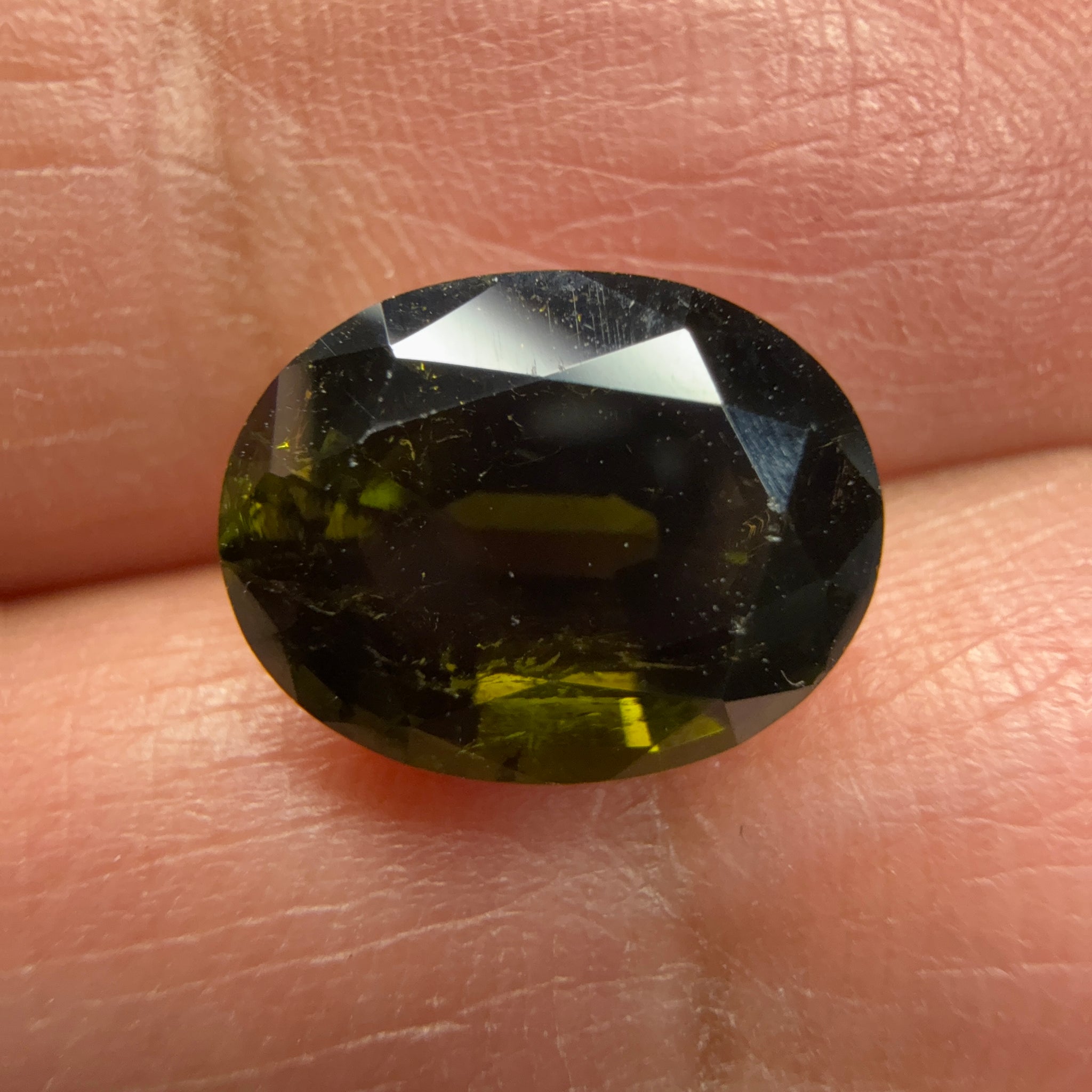 Chrome Tourmaline, 3.81ct, Tanzania, Untreated Unheated, native cut, a little too dark, see pictures, slight inclusions and slight scratches, but priced well if you can use it, photos in different lights as usual.