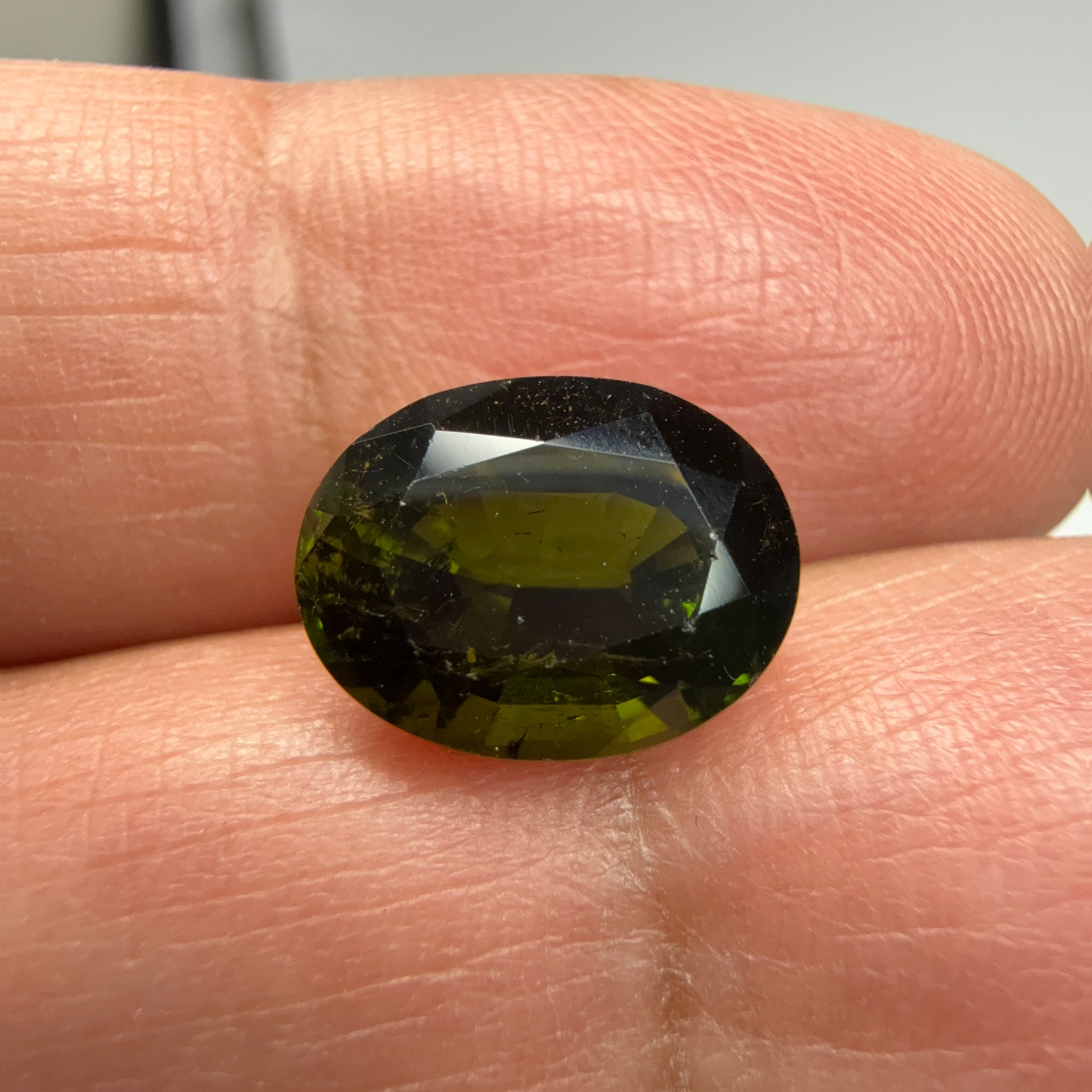 Chrome Tourmaline, 3.81ct, Tanzania, Untreated Unheated, native cut, a little too dark, see pictures, slight inclusions and slight scratches, but priced well if you can use it, photos in different lights as usual.