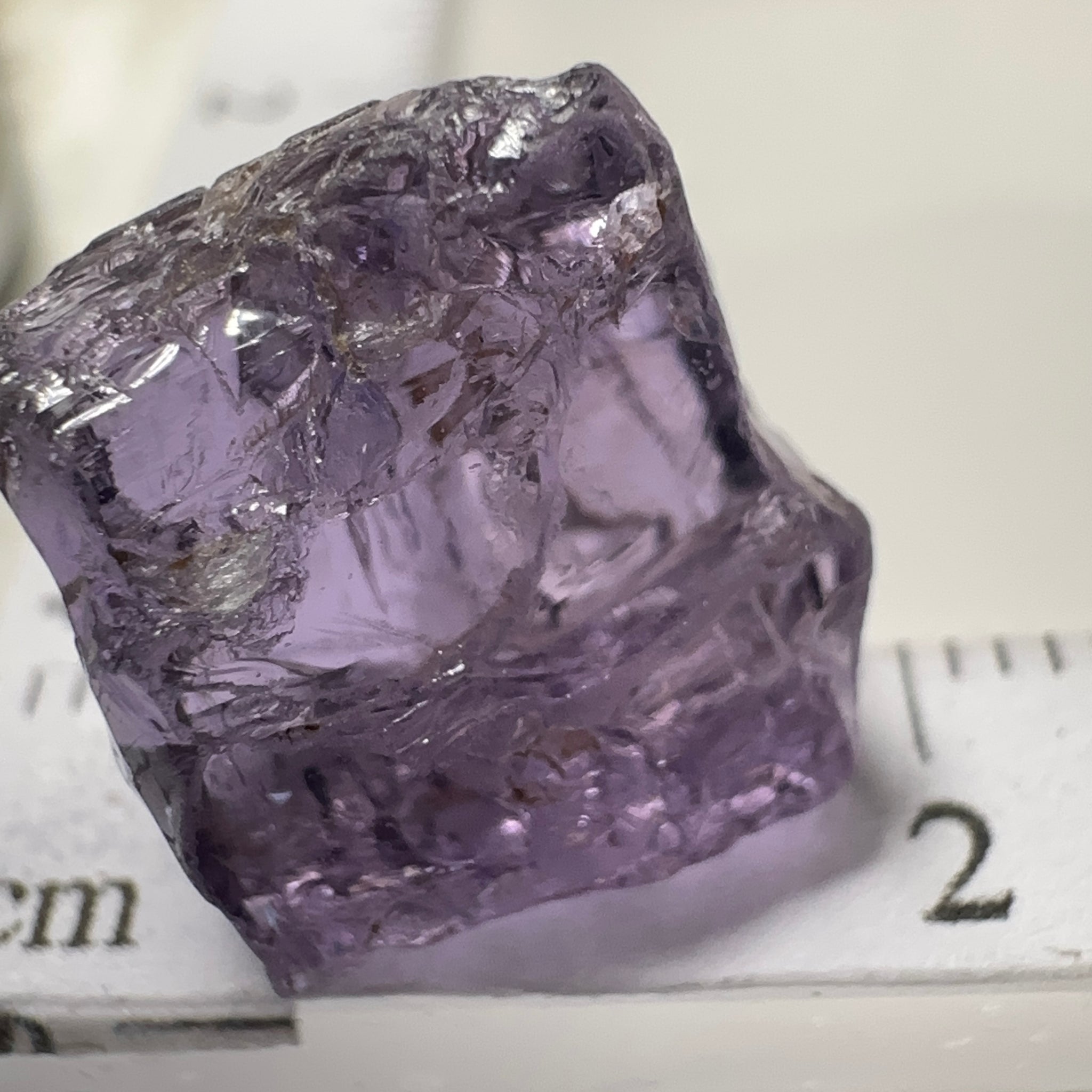 Purple Scapolite Crystal, 12.14ct, Tanzania, Untreated Unheated. Has a dividing crack, will need to be sawed, one side will be vvs-if clean, the other will be the same but will need some inclusions on the outside removed.