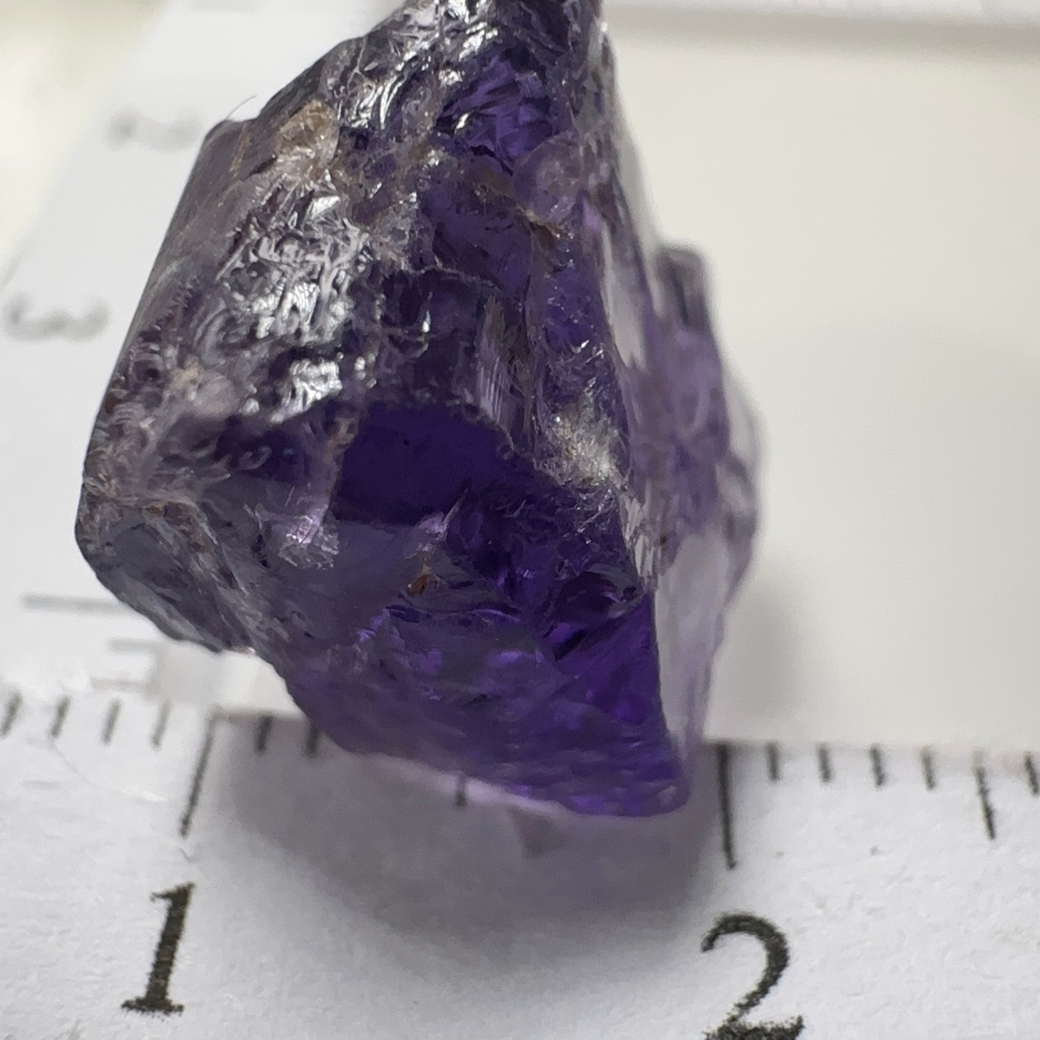 Purple Scapolite Crystal, 12.14ct, Tanzania, Untreated Unheated. Has a dividing crack, will need to be sawed, one side will be vvs-if clean, the other will be the same but will need some inclusions on the outside removed.