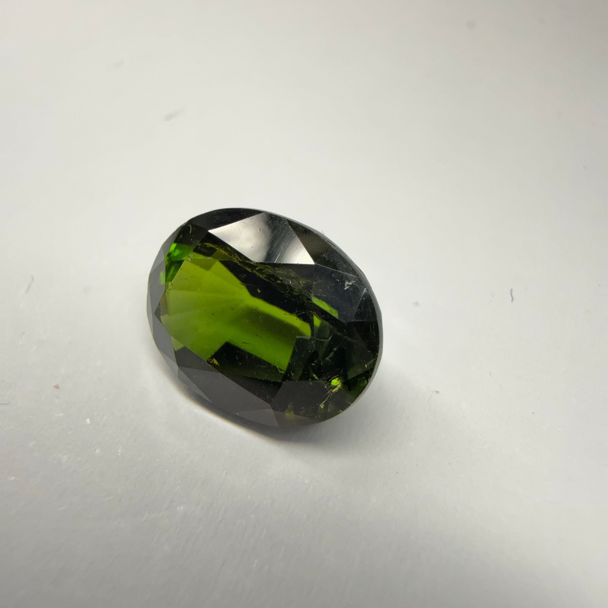 Chrome Tourmaline, 3.81ct, Tanzania, Untreated Unheated, native cut, a little too dark, see pictures, slight inclusions and slight scratches, but priced well if you can use it, photos in different lights as usual.