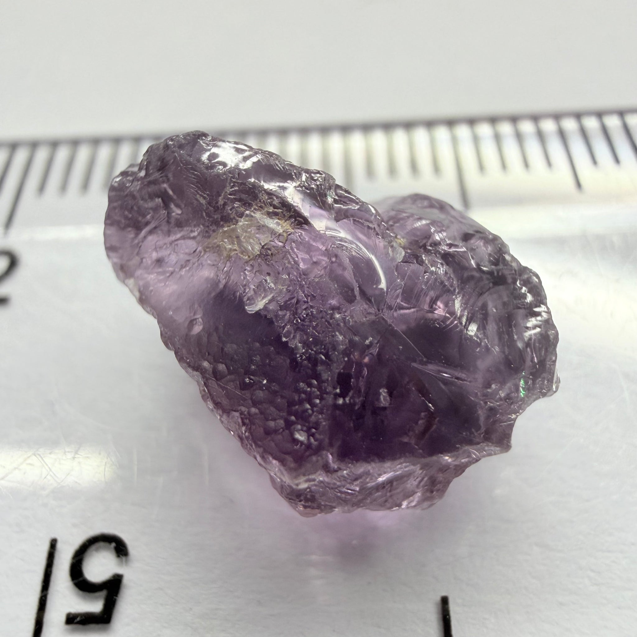 Purple Scapolite, 7.27ct, Tanzania, Untreated Unheated, inclusions on one side that have to be removed before faceting, till take away 1/4th of the stone, rest vvs-if