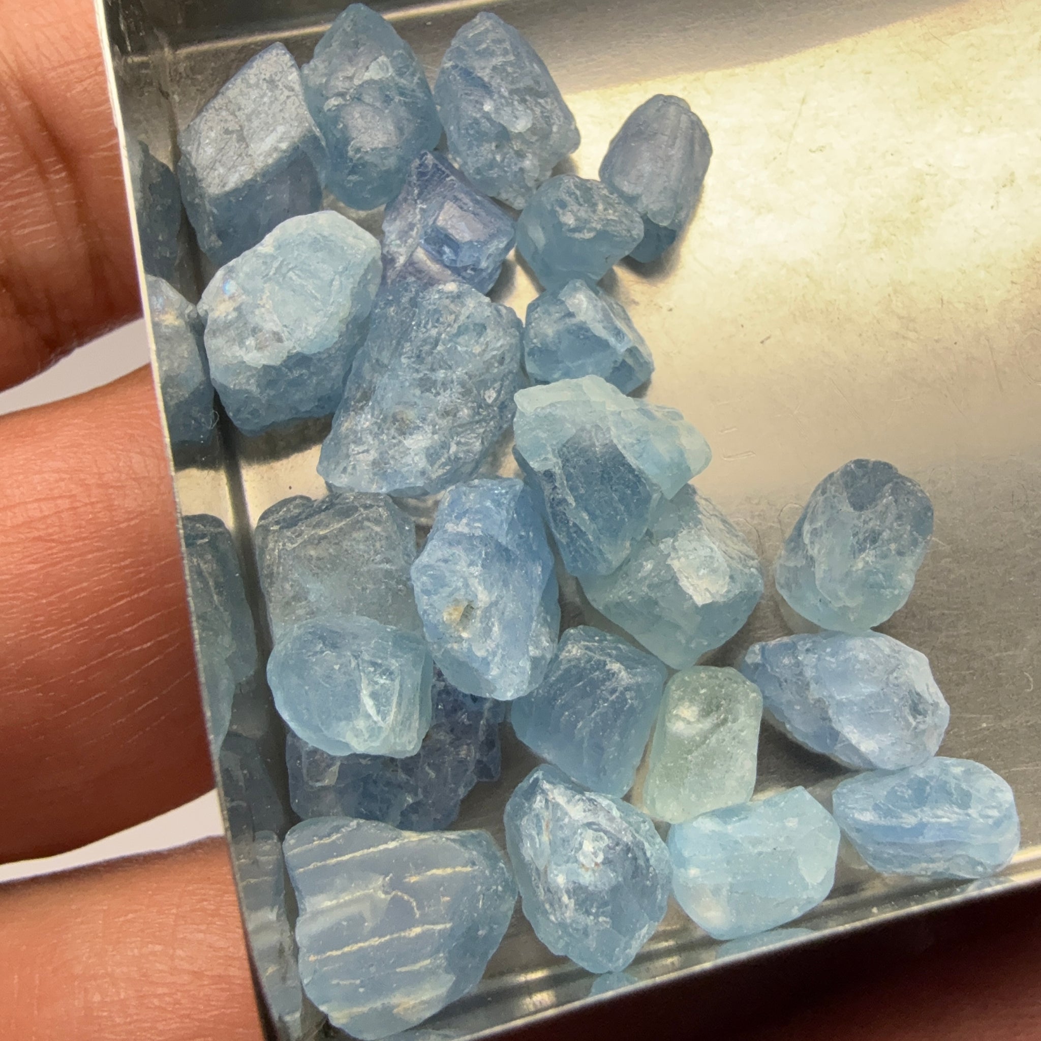 Blue Apatite Crystals from Merelani, Tanzania, Untreated Unheated. SINGLES price is per piece sold on a blind pour basis, specimen grade
