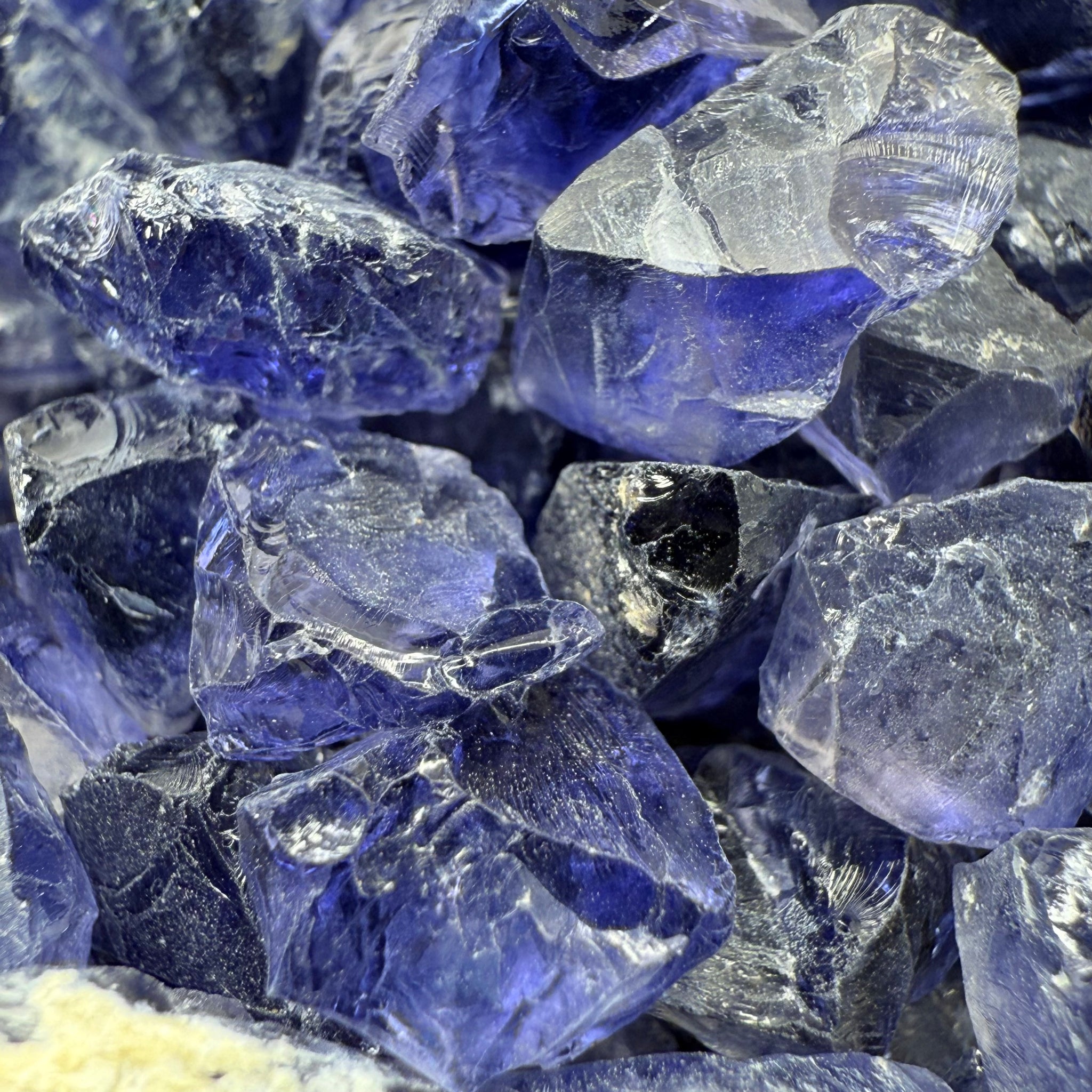 Iolite from Babati, Tanzania, Untreated Unheated, FACETING ROUGH, EYE CLEAN SINGLES- price is per stone on a bind pour basis, av size is 2.6ct