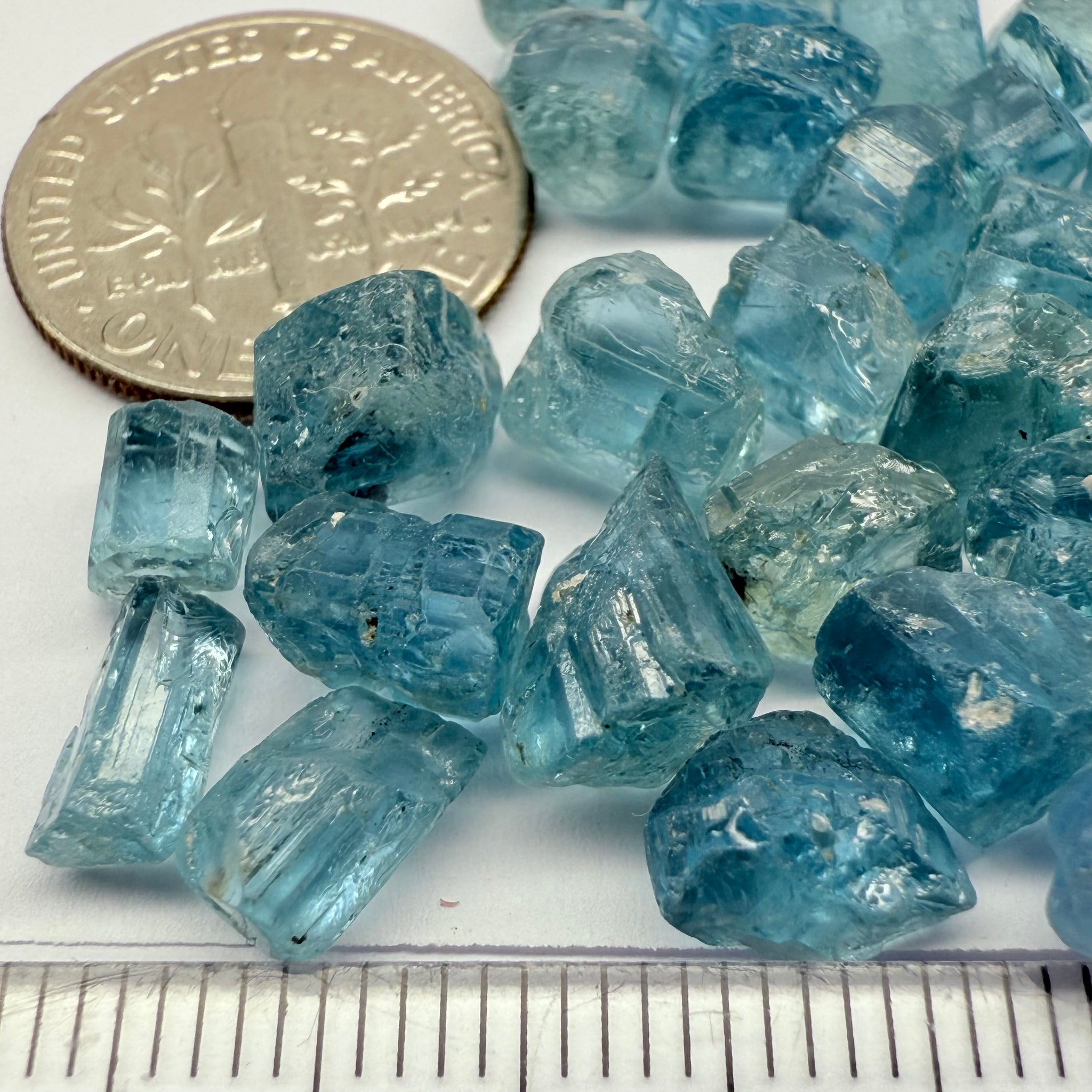 Blue Apatite Crystals from Merelani, Tanzania, Untreated Unheated. SINGLES price is per piece sold on a blind pour basis, av. 1.45ct