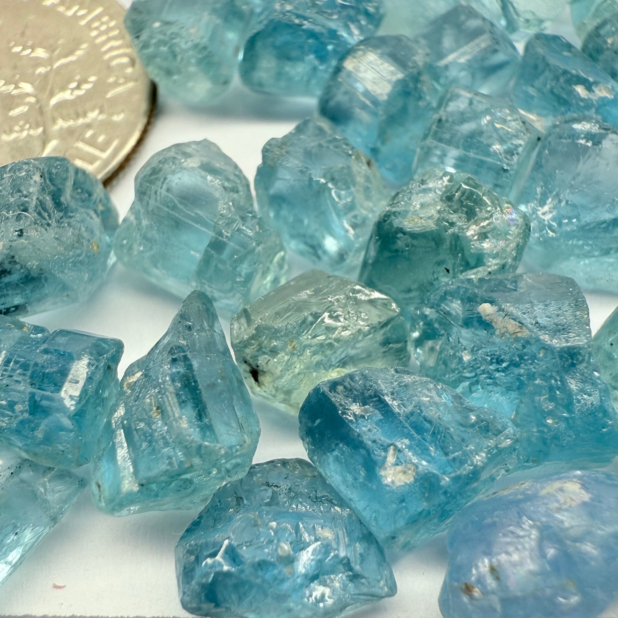 Blue Apatite Crystals from Merelani, Tanzania, Untreated Unheated. SINGLES price is per piece sold on a blind pour basis, av. 1.45ct
