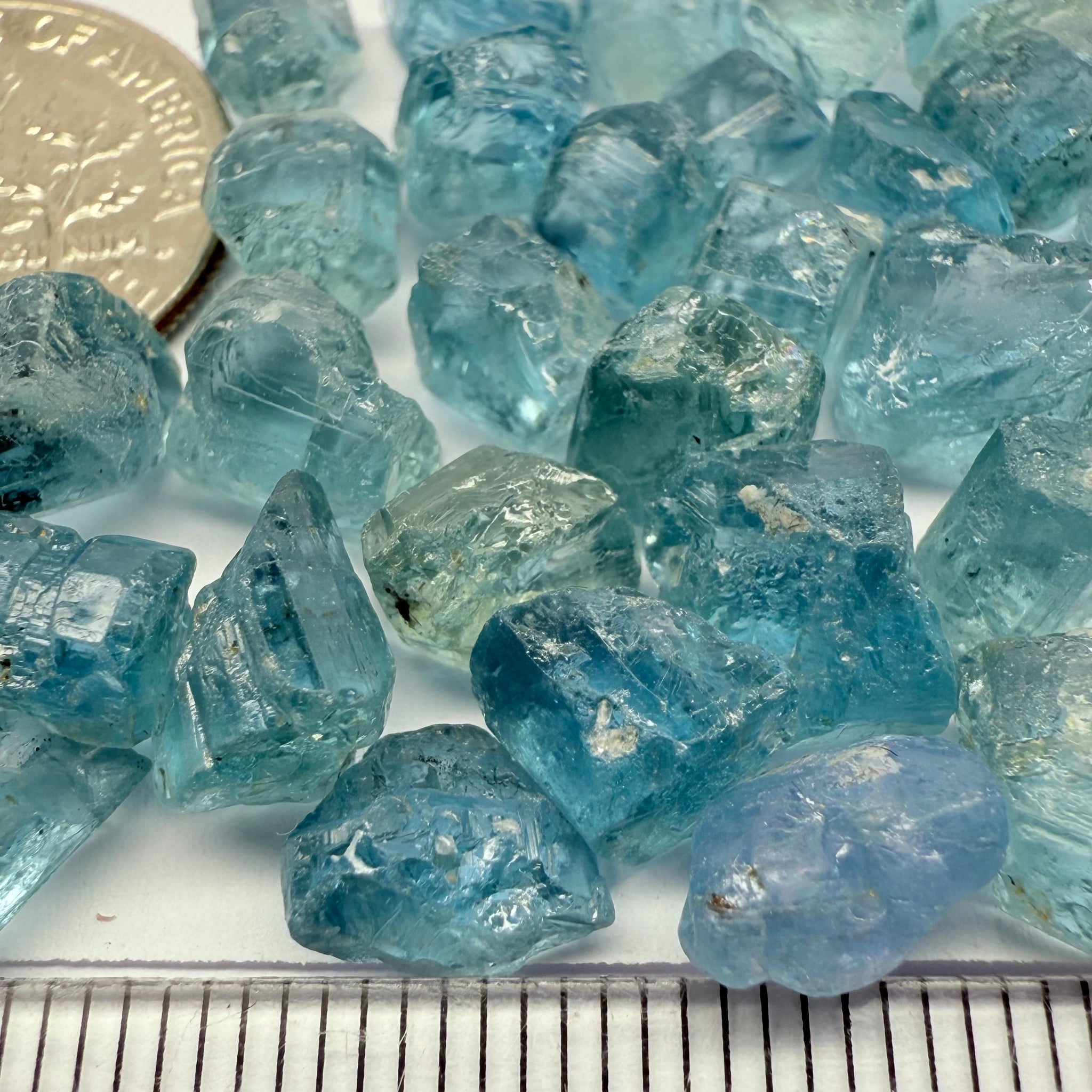 Blue Apatite Crystals from Merelani, Tanzania, Untreated Unheated. SINGLES price is per piece sold on a blind pour basis, av. 1.45ct
