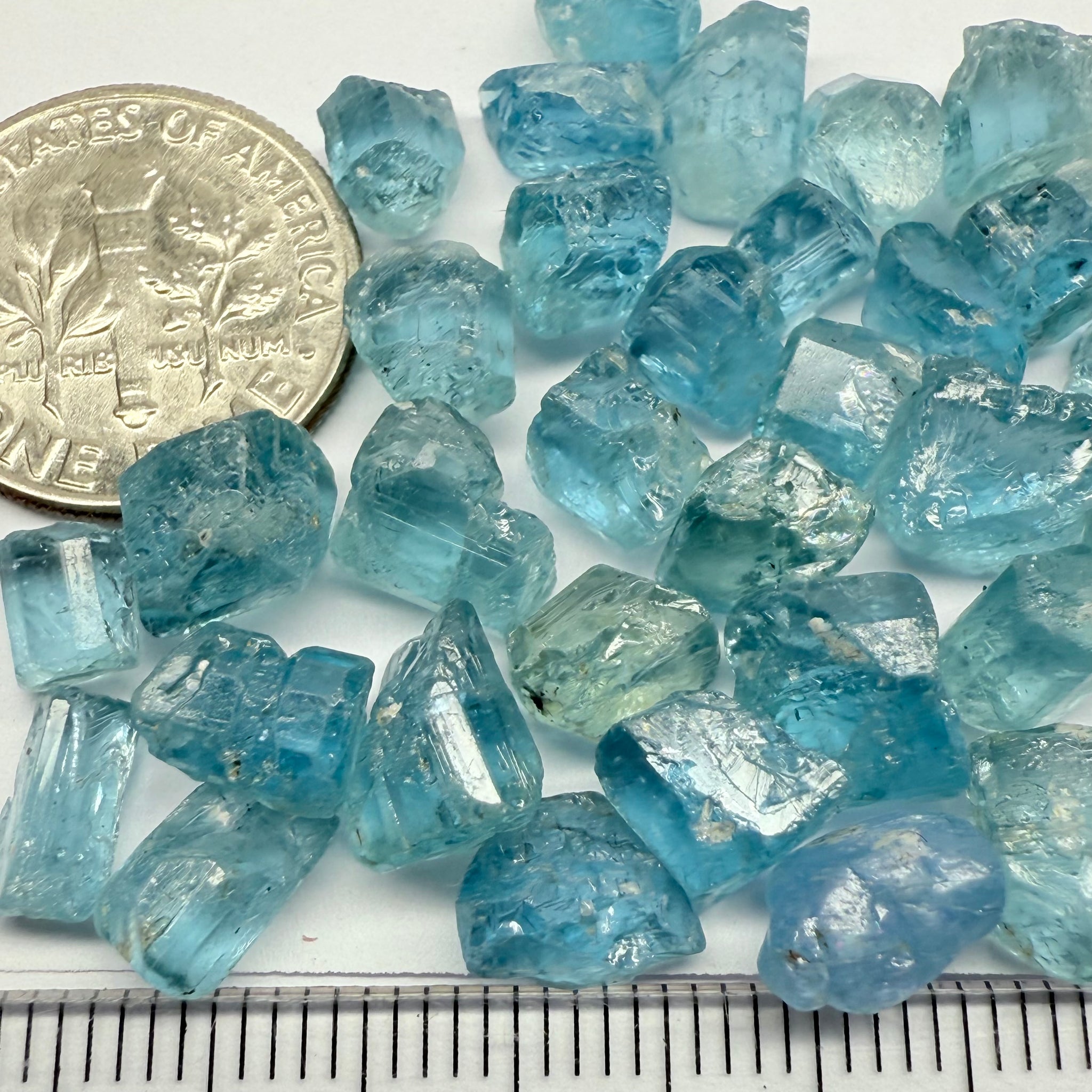 Blue Apatite Crystals from Merelani, Tanzania, Untreated Unheated. SINGLES price is per piece sold on a blind pour basis, av. 1.45ct