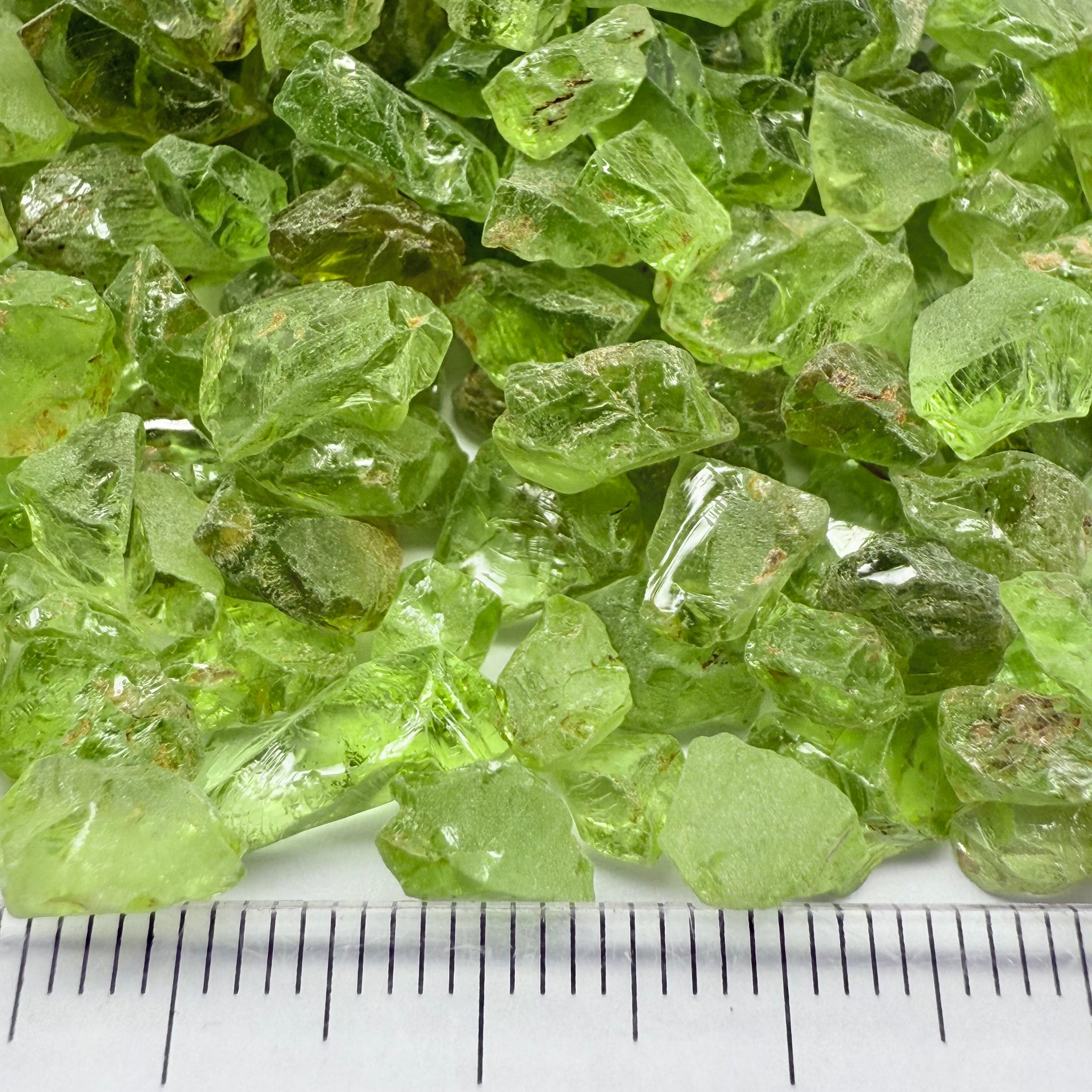 GoGo Peridot, Mined by the Wa GoGo tribe in Tanzania, Untreated Unheated, mixed clarity grades, FACETING ROUGH, SINGLES- price is per stone on a bind pour basis, av size is 1.89ct, excellent deal