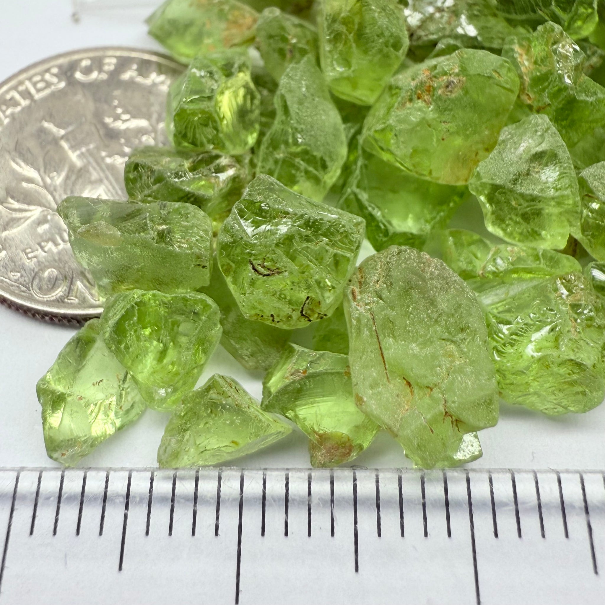 GoGo Peridot, Mined by the Wa GoGo tribe in Tanzania, Untreated Unheated, mixed clarity grades, FACETING ROUGH, SINGLES- price is per stone on a bind pour basis, av size is 1.89ct, excellent deal