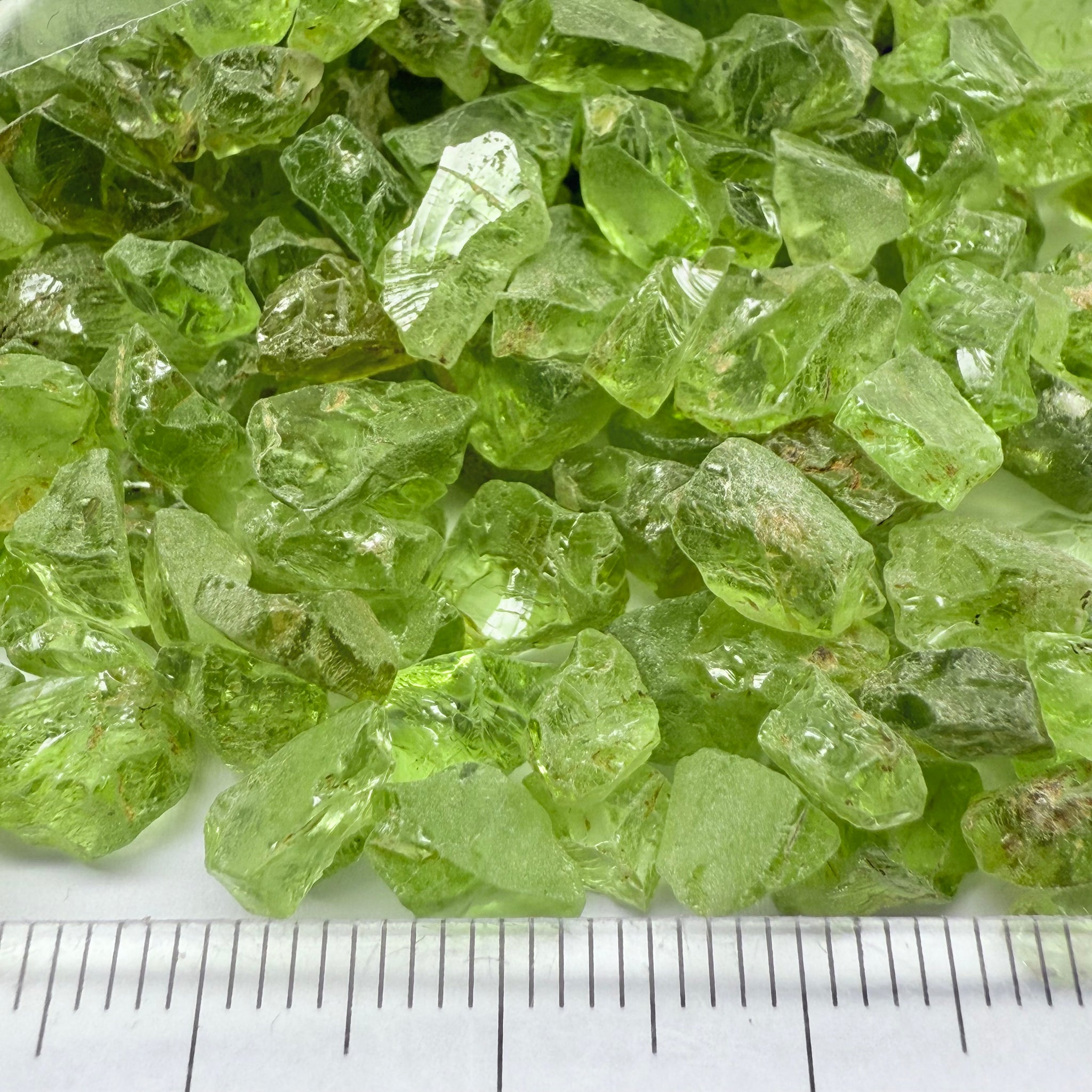 GoGo Peridot, Mined by the Wa GoGo tribe in Tanzania, Untreated Unheated, mixed clarity grades, FACETING ROUGH, SINGLES- price is per stone on a bind pour basis, av size is 1.89ct, excellent deal
