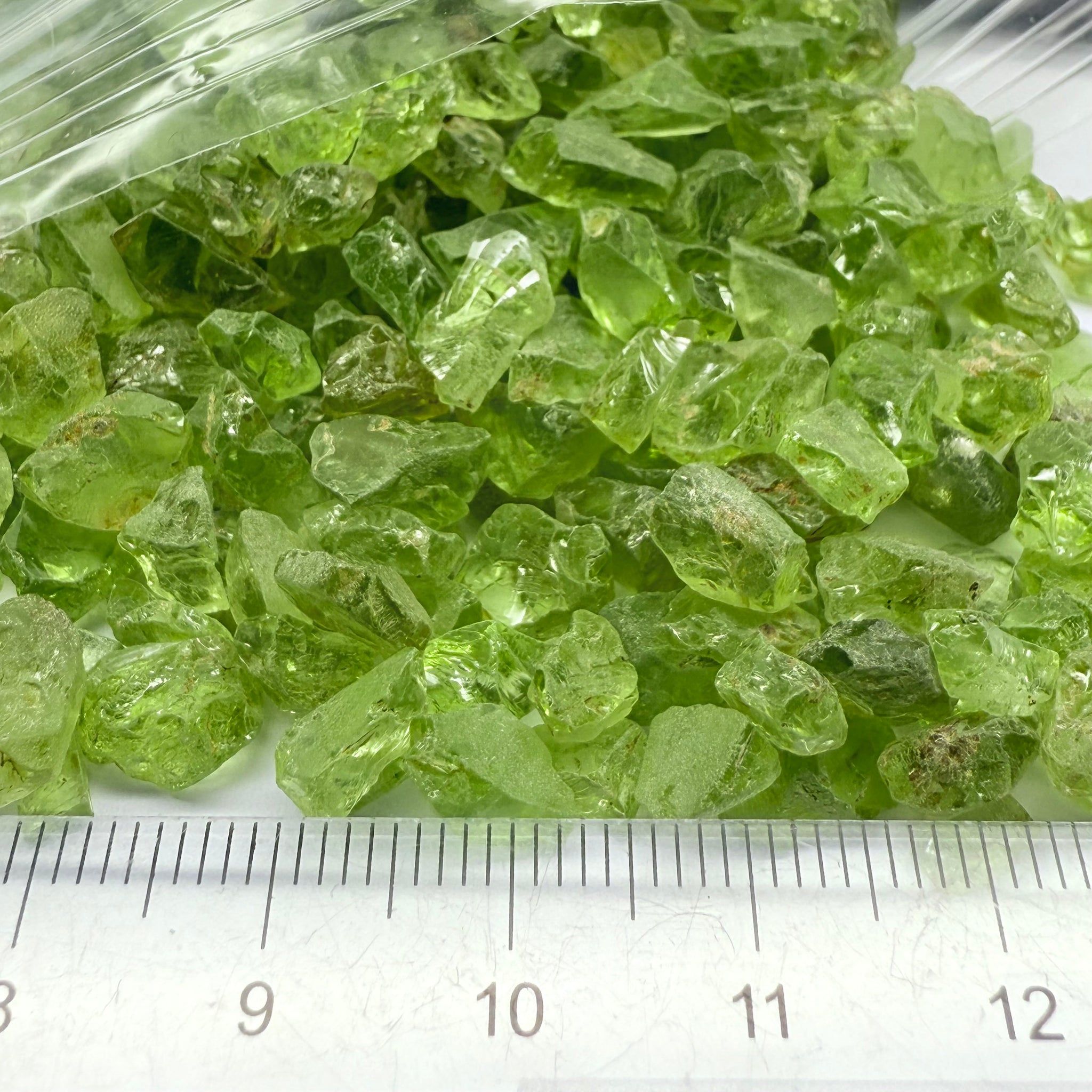 GoGo Peridot, Mined by the Wa GoGo tribe in Tanzania, Untreated Unheated, mixed clarity grades, FACETING ROUGH, SINGLES- price is per stone on a bind pour basis, av size is 1.89ct, excellent deal