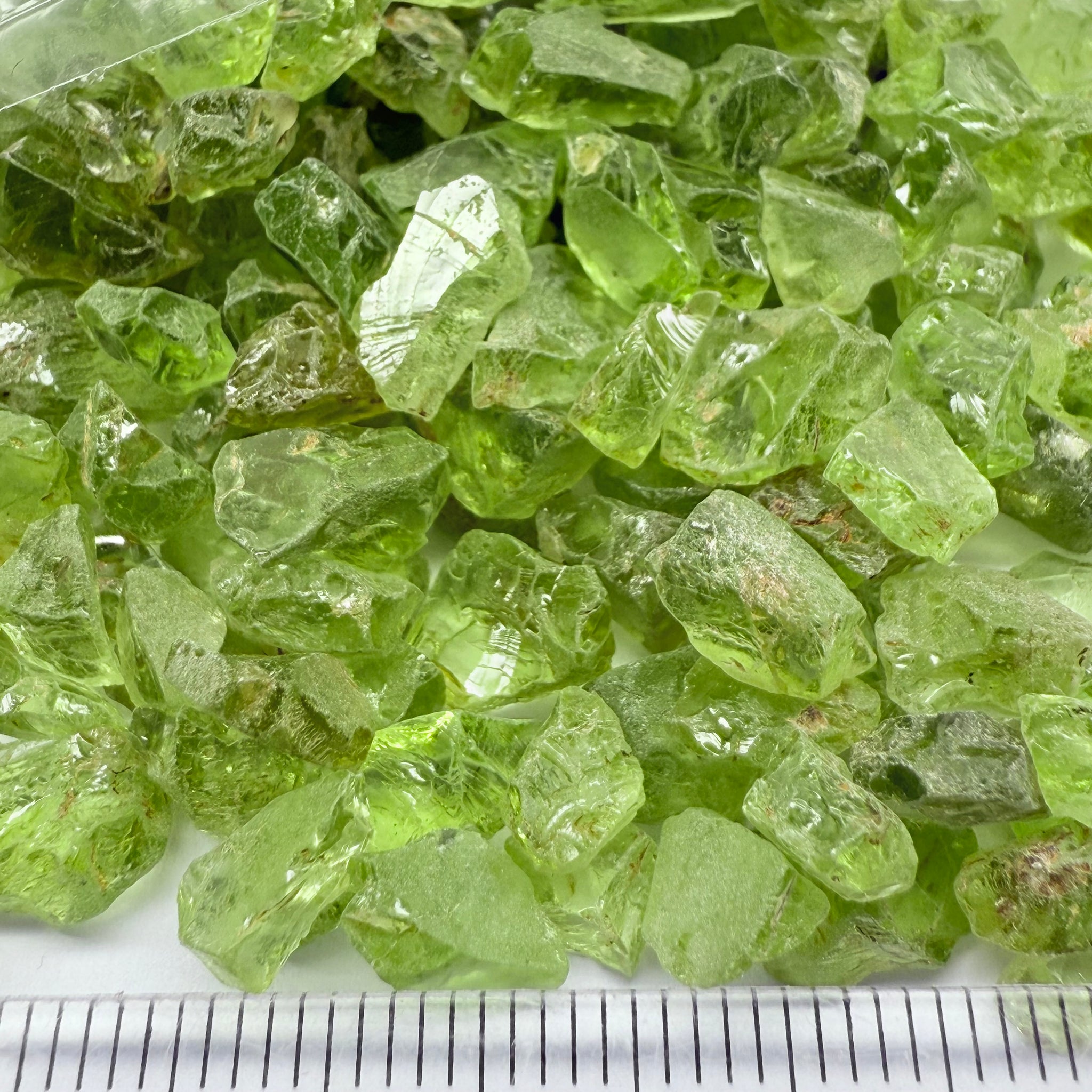 GoGo Peridot, Mined by the Wa GoGo tribe in Tanzania, Untreated Unheated, mixed clarity grades, FACETING ROUGH, SINGLES- price is per stone on a bind pour basis, av size is 1.89ct, excellent deal