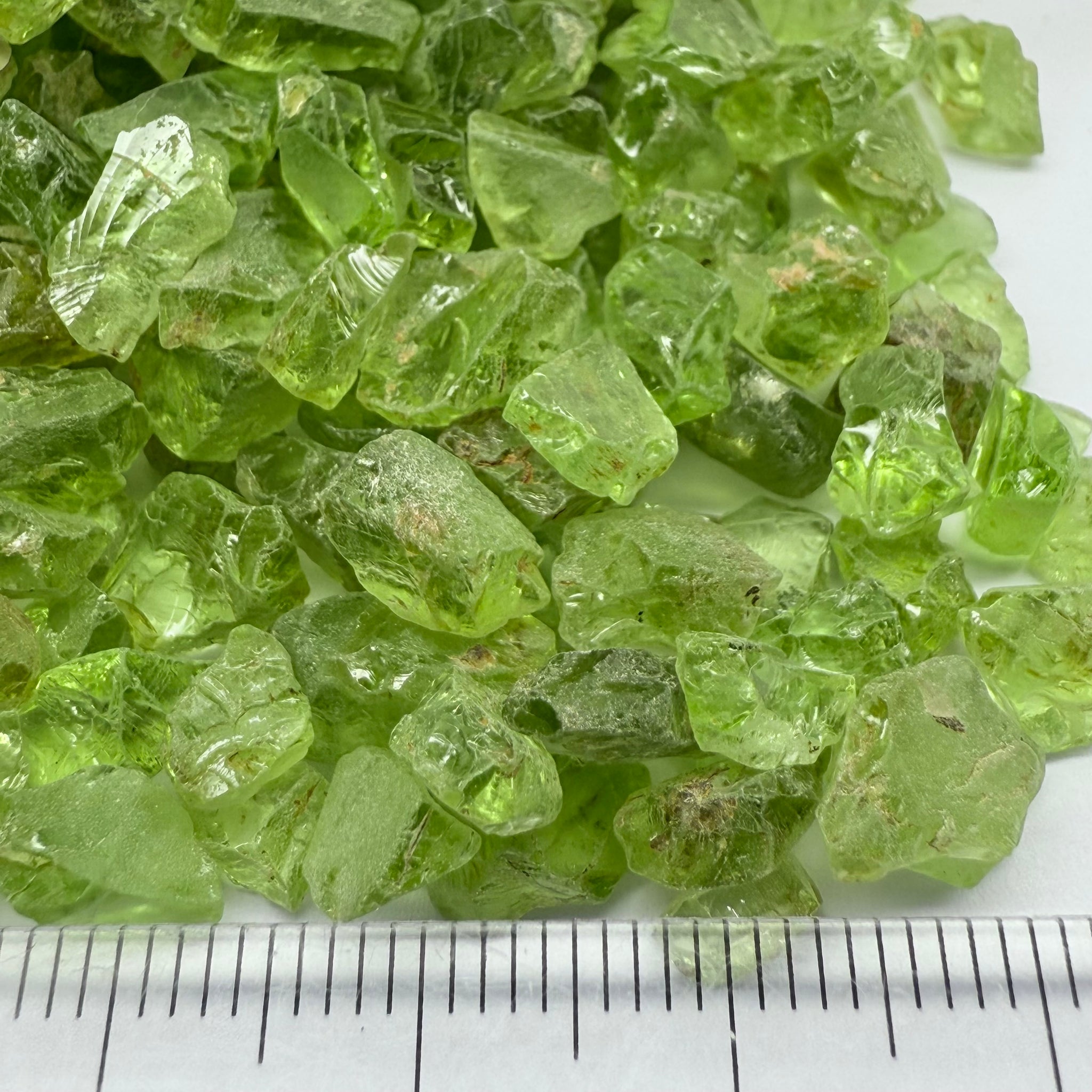 GoGo Peridot, Mined by the Wa GoGo tribe in Tanzania, Untreated Unheated, mixed clarity grades, FACETING ROUGH, SINGLES- price is per stone on a bind pour basis, av size is 1.89ct, excellent deal