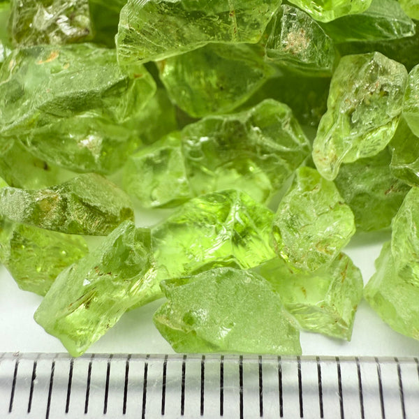GoGo Peridot, Mined by the Wa GoGo tribe in Tanzania, Untreated Unheated, mixed clarity grades, FACETING ROUGH, SINGLES- price is per stone on a bind pour basis, av size is 1.89ct, excellent deal