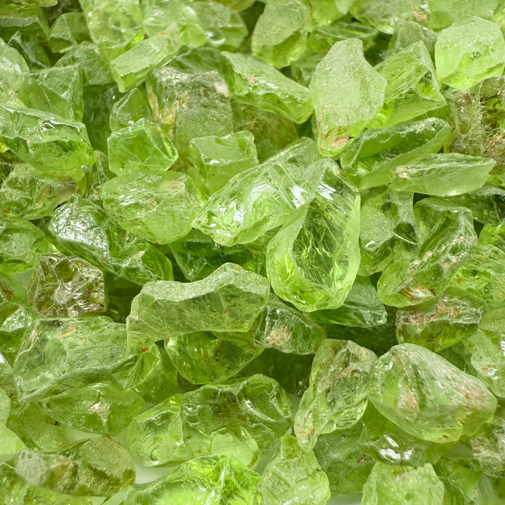 GoGo Peridot, Mined by the Wa GoGo tribe in Tanzania, Untreated Unheated, mixed clarity grades, FACETING ROUGH, SINGLES- price is per stone on a bind pour basis, av size is 1.89ct, excellent deal