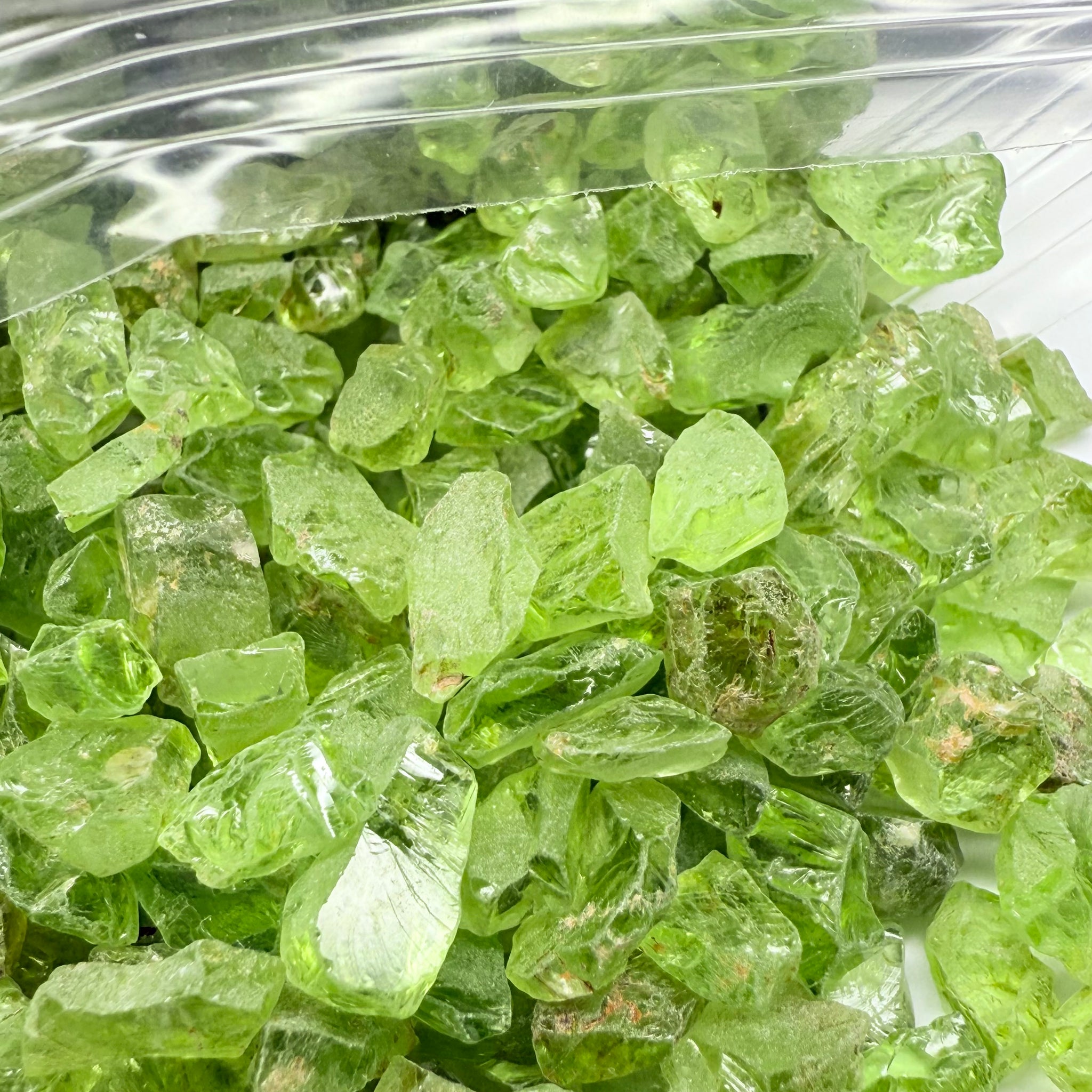 GoGo Peridot, Mined by the Wa GoGo tribe in Tanzania, Untreated Unheated, mixed clarity grades, FACETING ROUGH, SINGLES- price is per stone on a bind pour basis, av size is 1.89ct, excellent deal