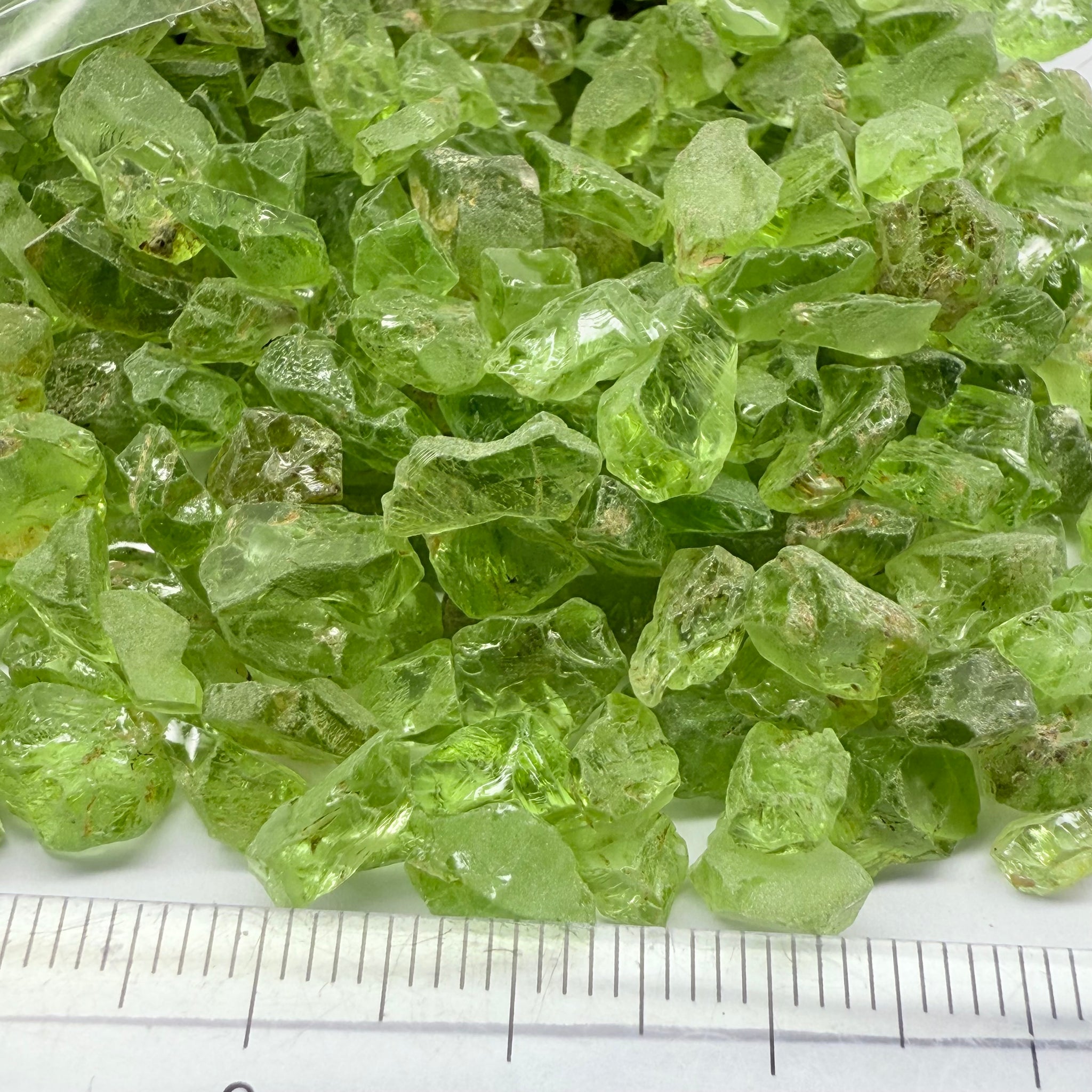 GoGo Peridot, Mined by the Wa GoGo tribe in Tanzania, Untreated Unheated, mixed clarity grades, FACETING ROUGH, SINGLES- price is per stone on a bind pour basis, av size is 1.89ct, excellent deal