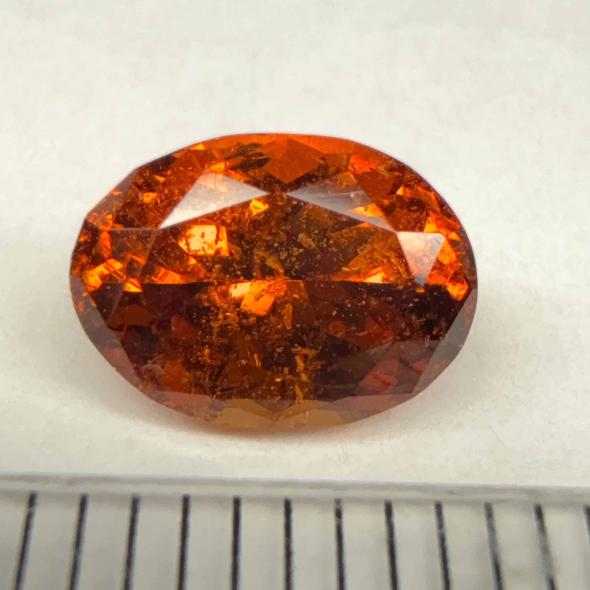Spessartite Garnet, 1.85ct, Tanzania, Unheated Untreated, slight chip on a facet, I have circled it, priced low