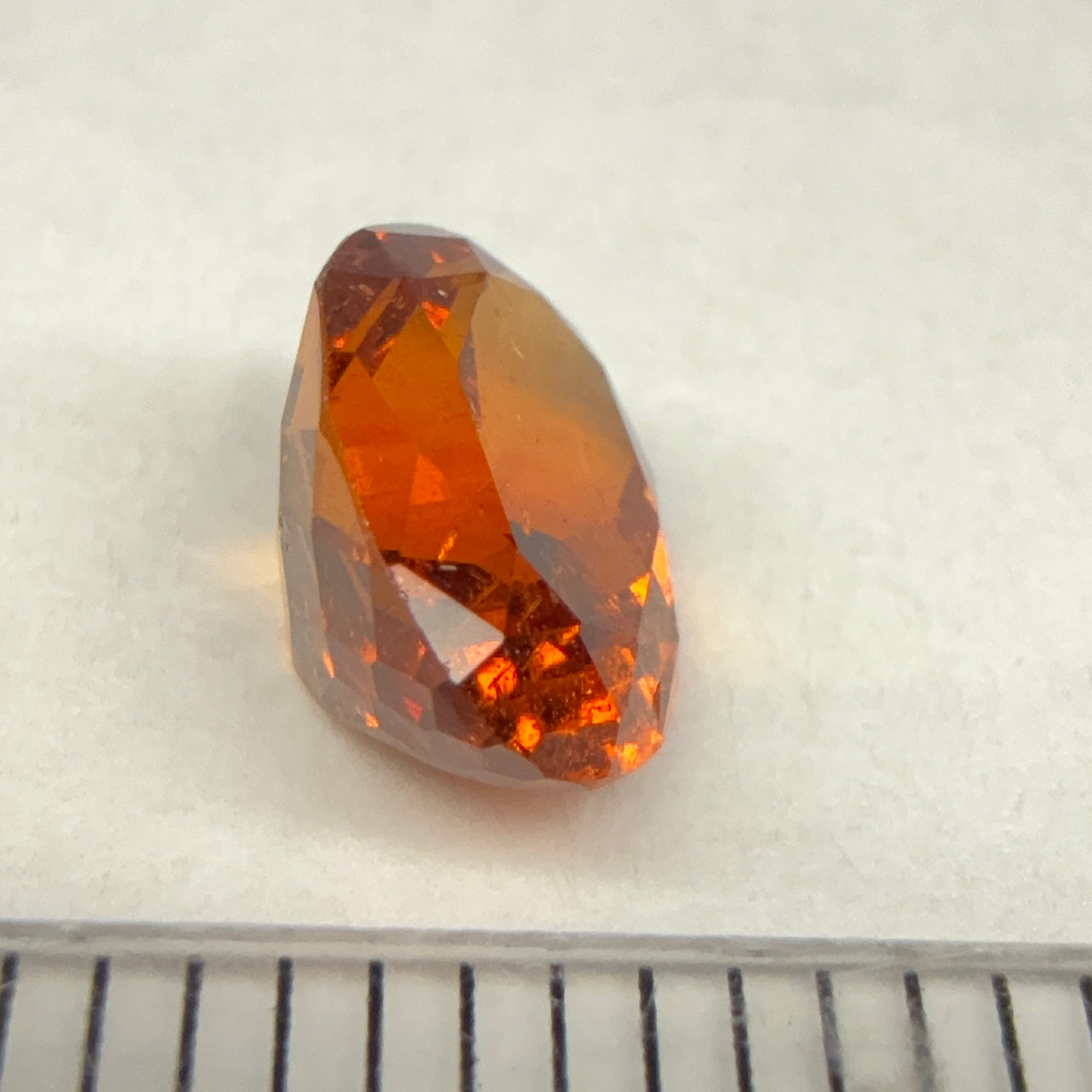 Spessartite Garnet, 1.85ct, Tanzania, Unheated Untreated, slight chip on a facet, I have circled it, priced low