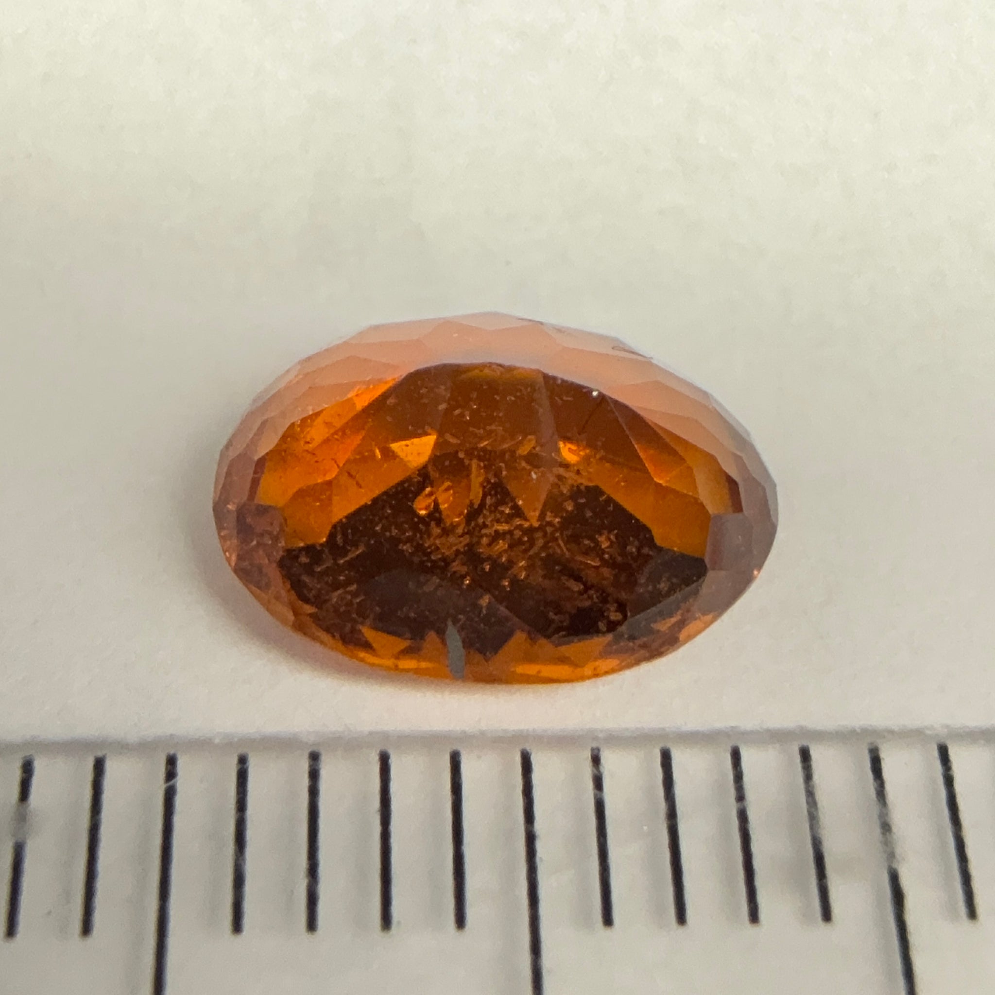 Spessartite Garnet, 1.85ct, Tanzania, Unheated Untreated, slight chip on a facet, I have circled it, priced low