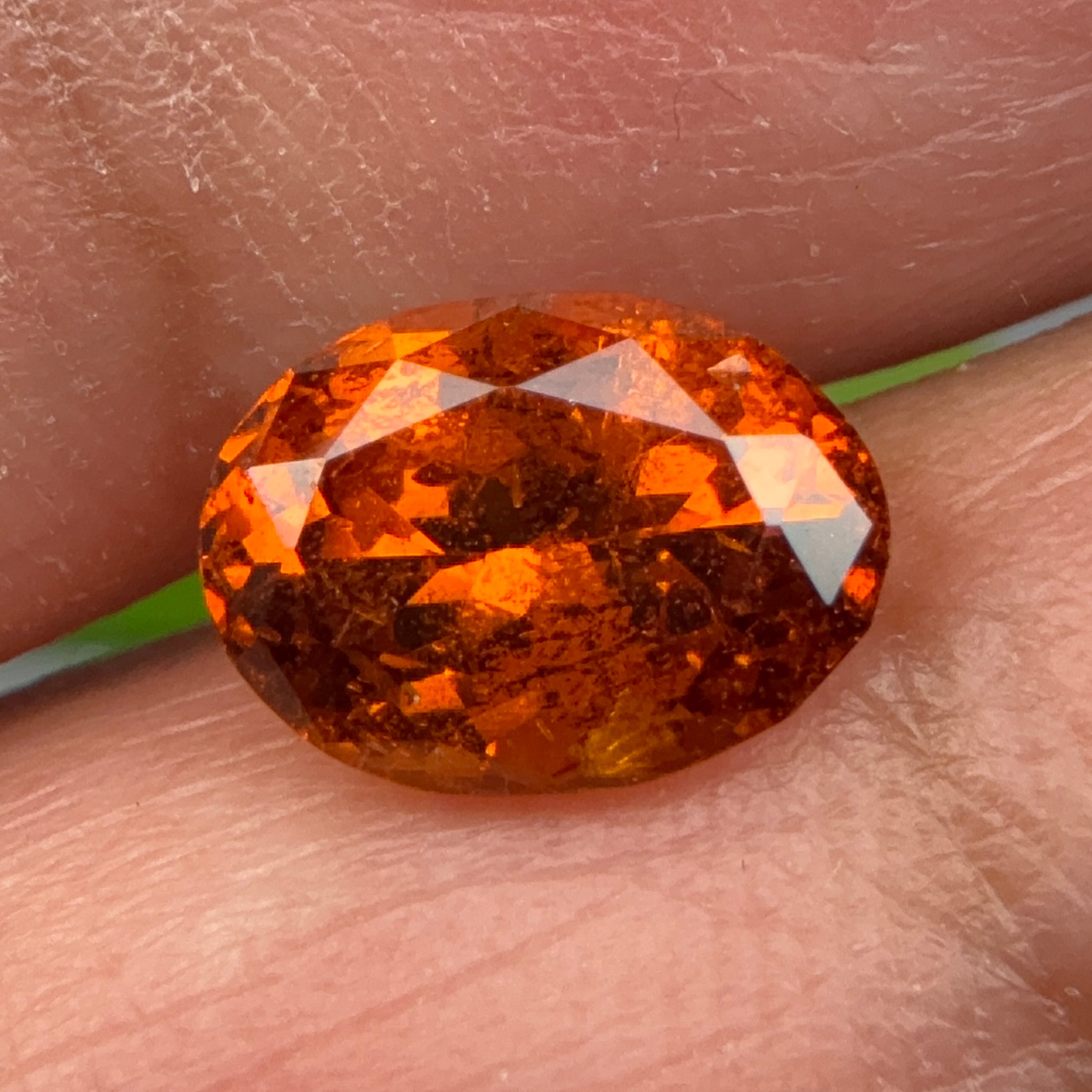 Spessartite Garnet, 1.85ct, Tanzania, Unheated Untreated, slight chip on a facet, I have circled it, priced low