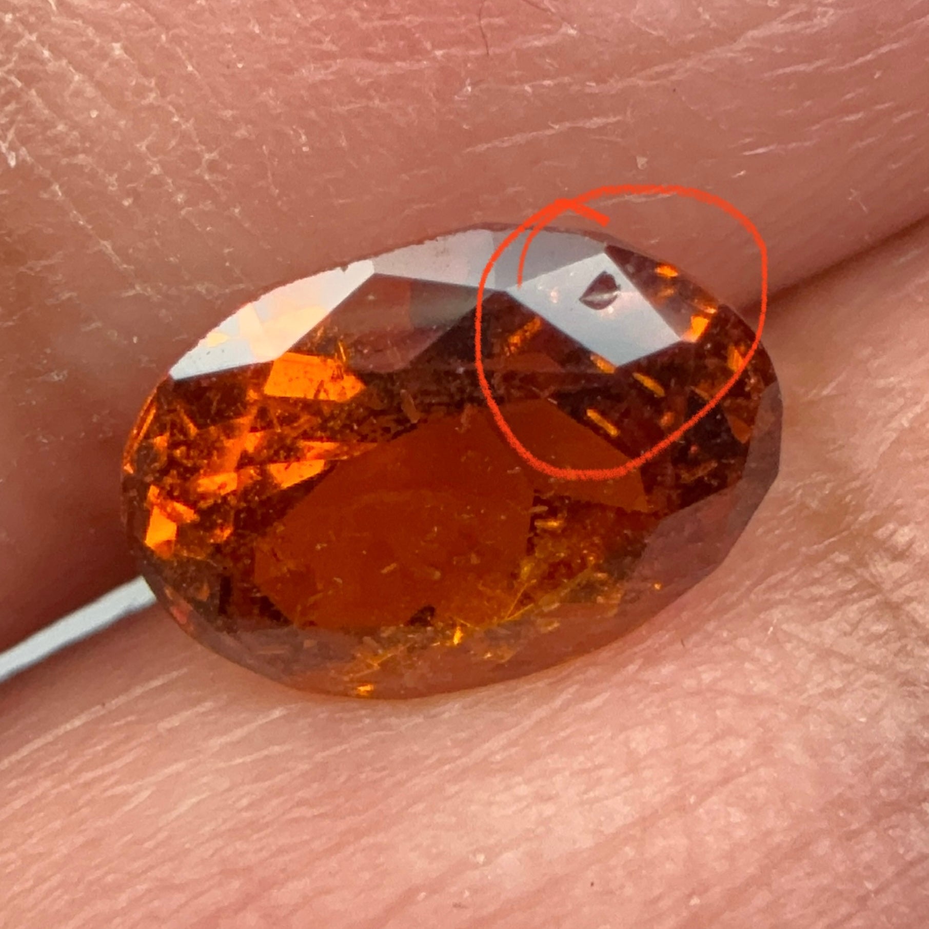 Spessartite Garnet, 1.85ct, Tanzania, Unheated Untreated, slight chip on a facet, I have circled it, priced low
