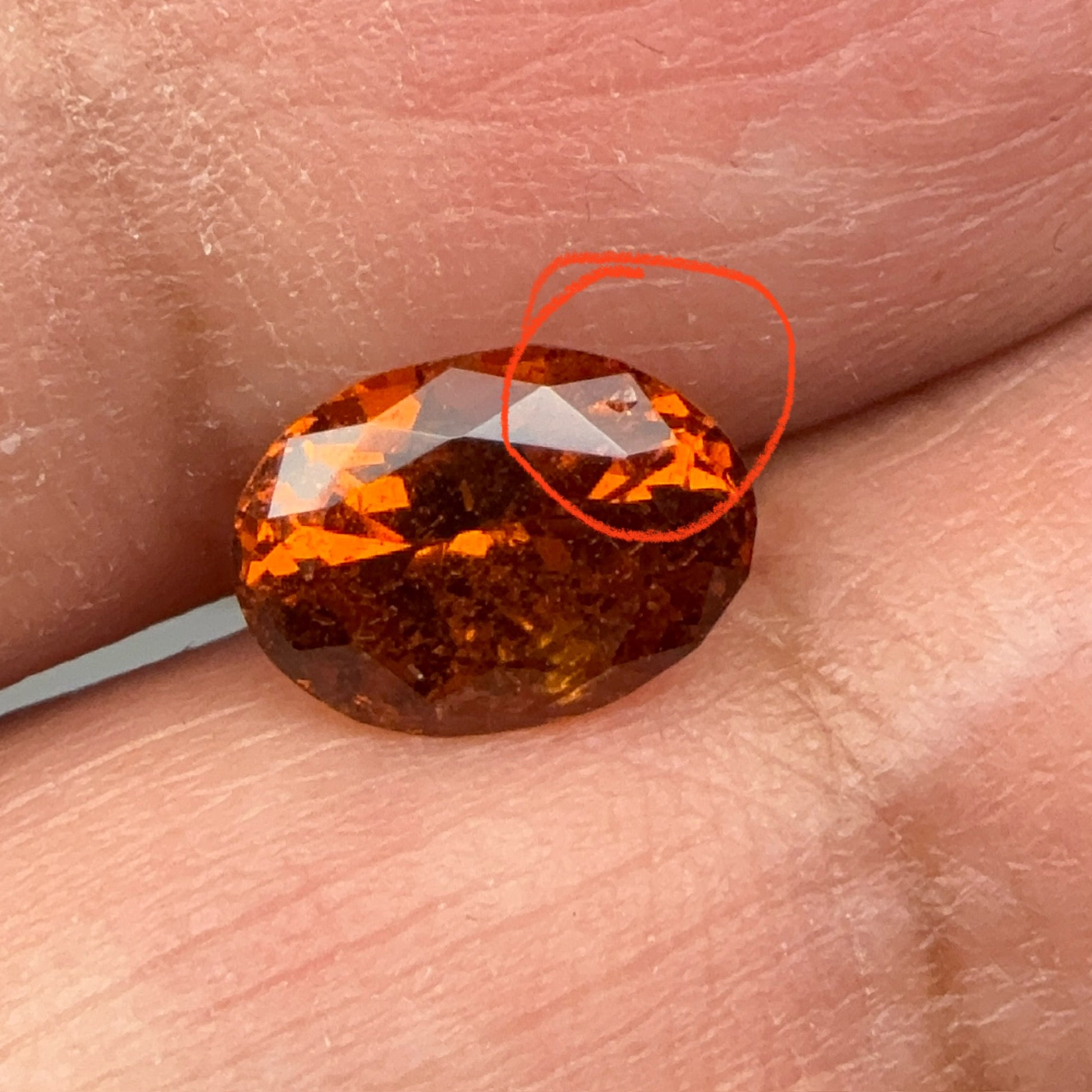 Spessartite Garnet, 1.85ct, Tanzania, Unheated Untreated, slight chip on a facet, I have circled it, priced low