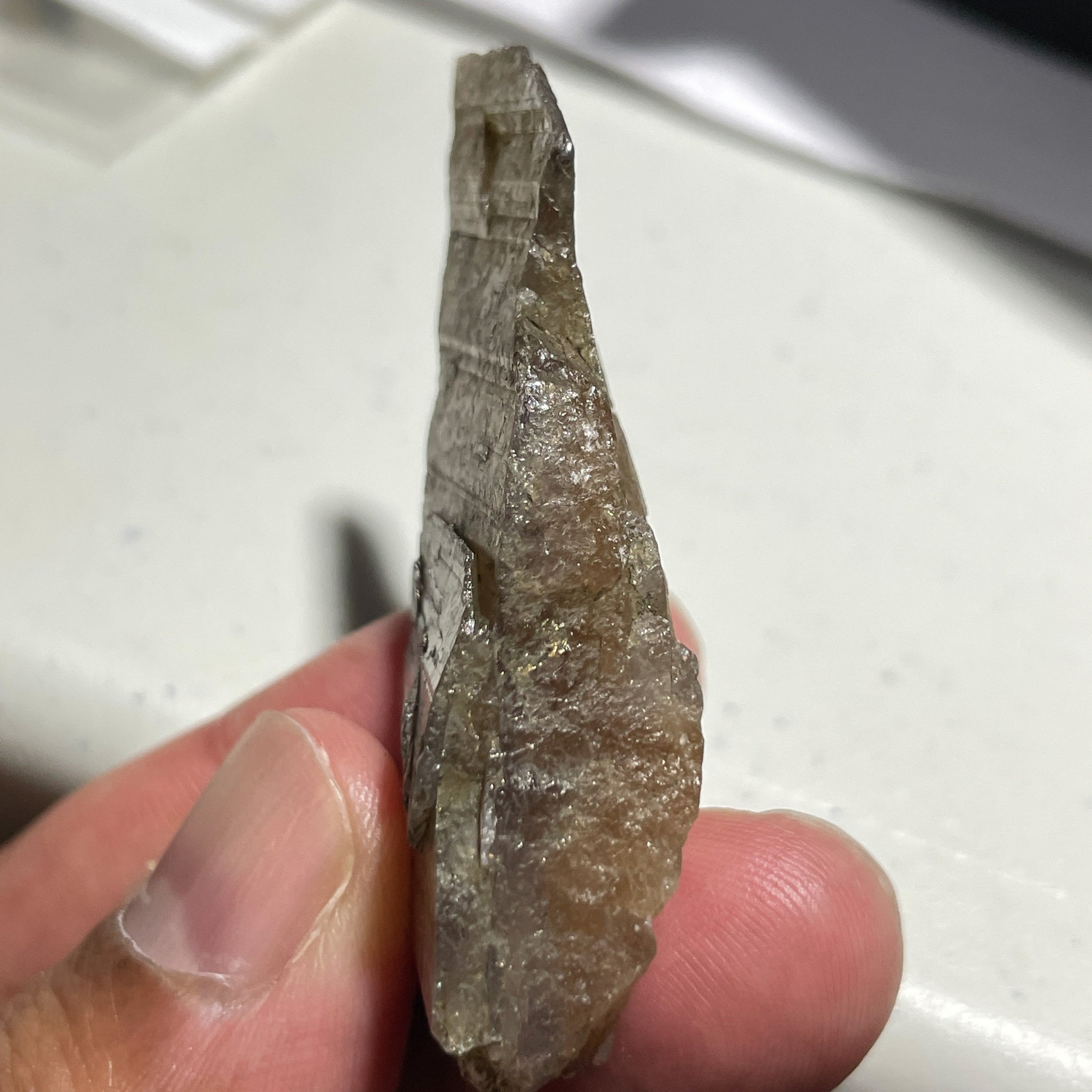 122Ct Magnesio Axinite Crystal Merelani Tanzania. 6.1 X 2.2 1.8Cm