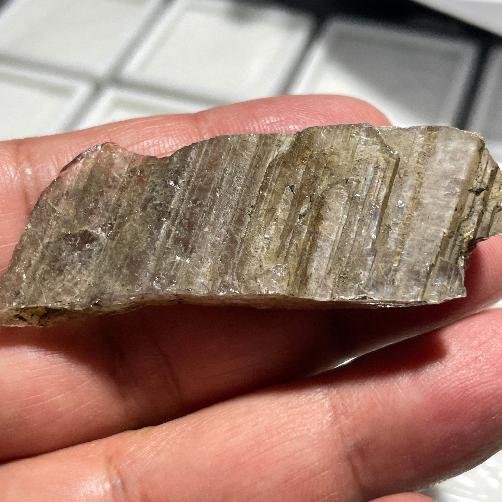 122Ct Magnesio Axinite Crystal Merelani Tanzania. 6.1 X 2.2 1.8Cm