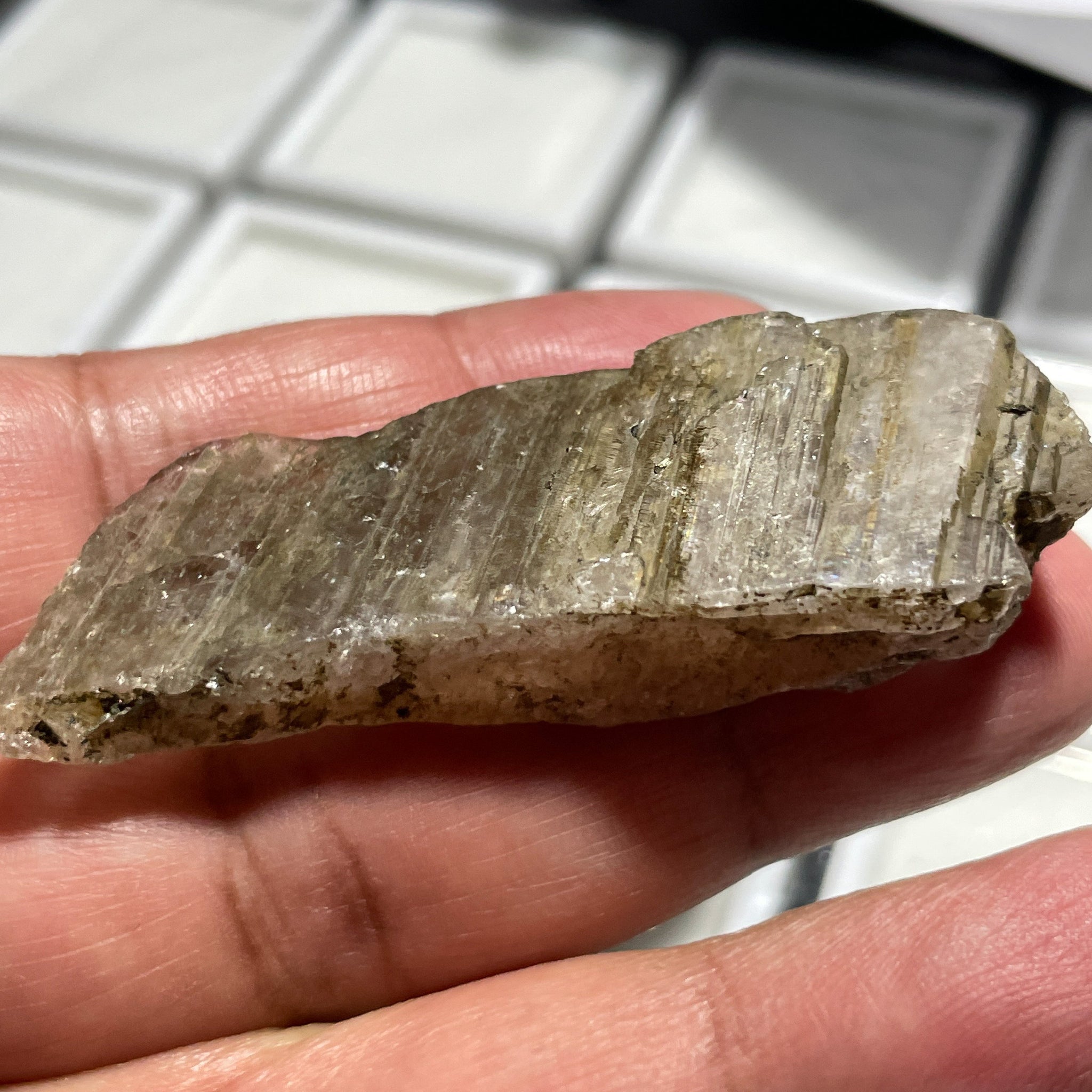 122Ct Magnesio Axinite Crystal Merelani Tanzania. 6.1 X 2.2 1.8Cm