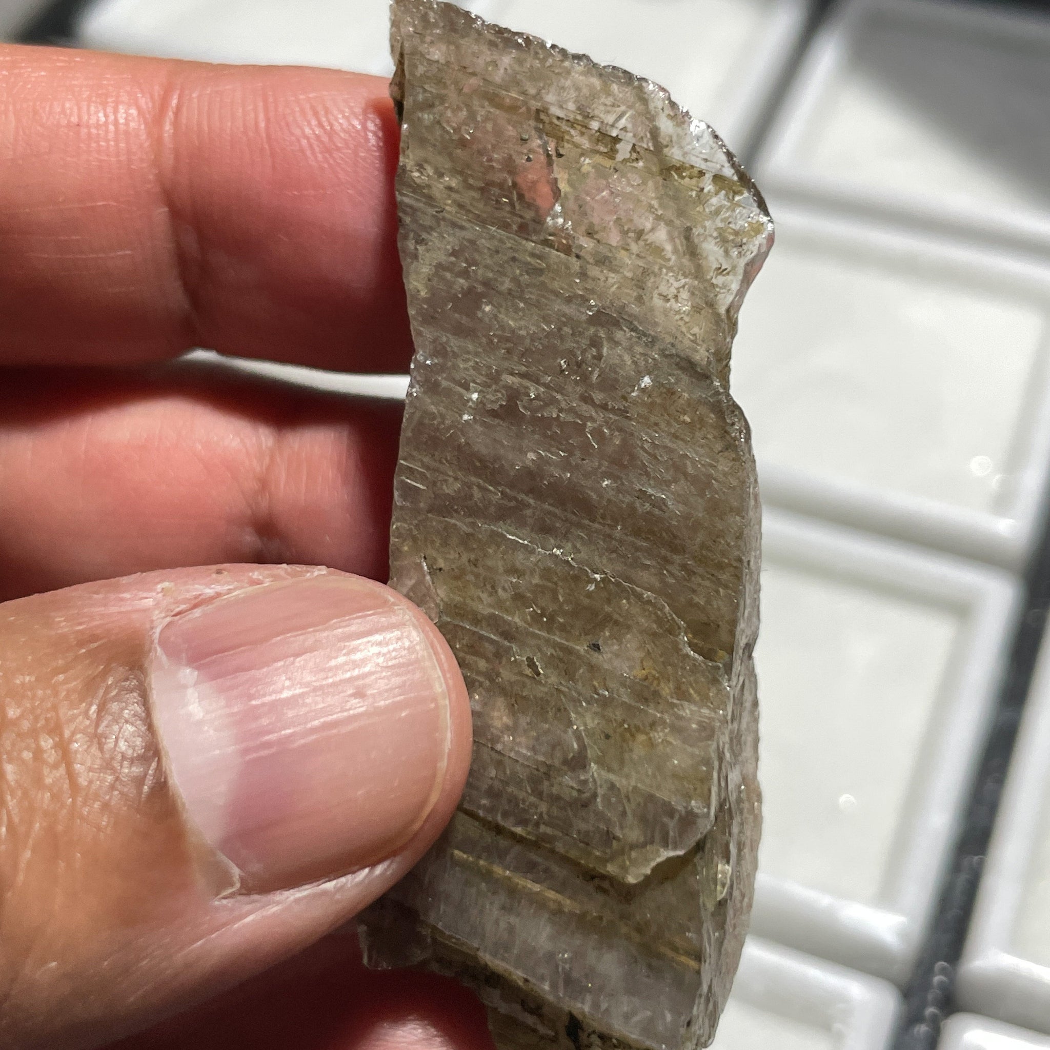 122Ct Magnesio Axinite Crystal Merelani Tanzania. 6.1 X 2.2 1.8Cm