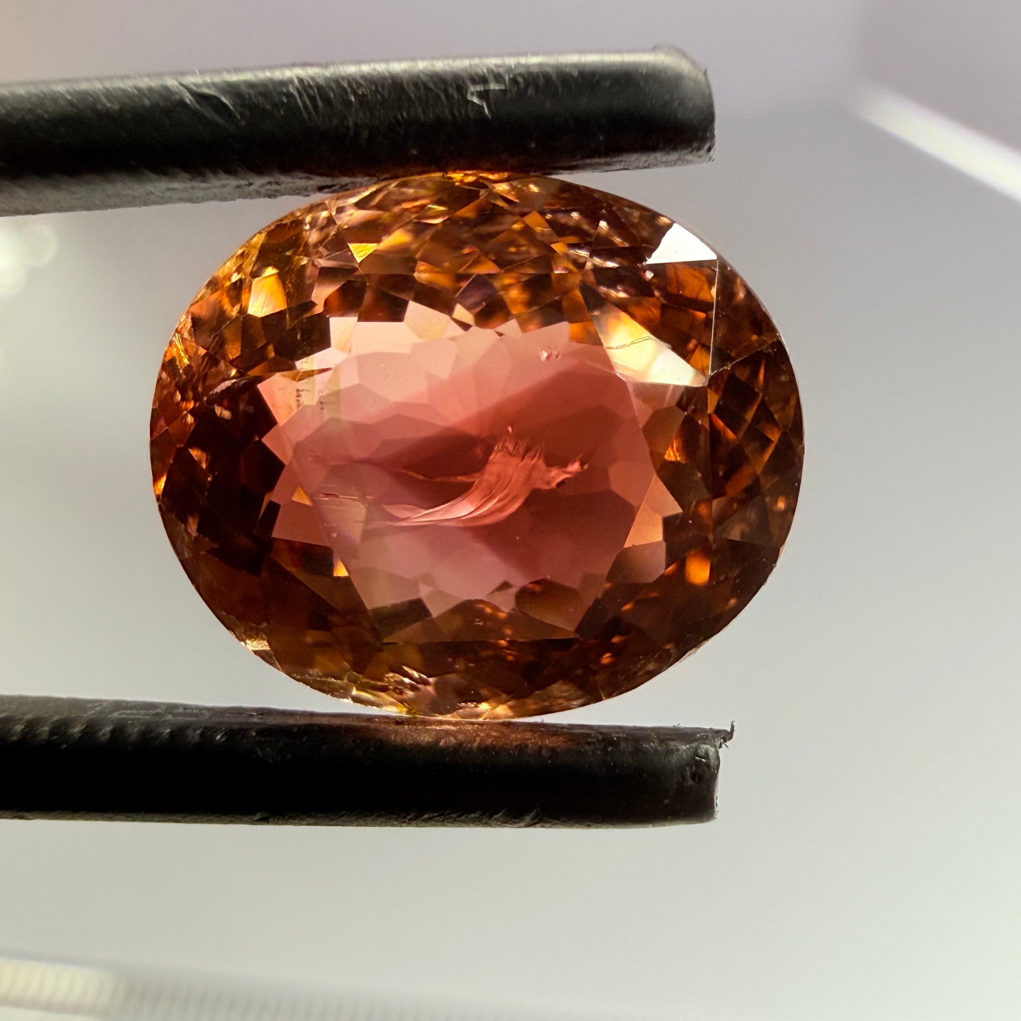 Tourmaline, 6.08ct, DRC, Untreated Unheated, slight chip on the table, see next pic we have circled it, and a large crack in the middle, but look at the triangular zoning!
